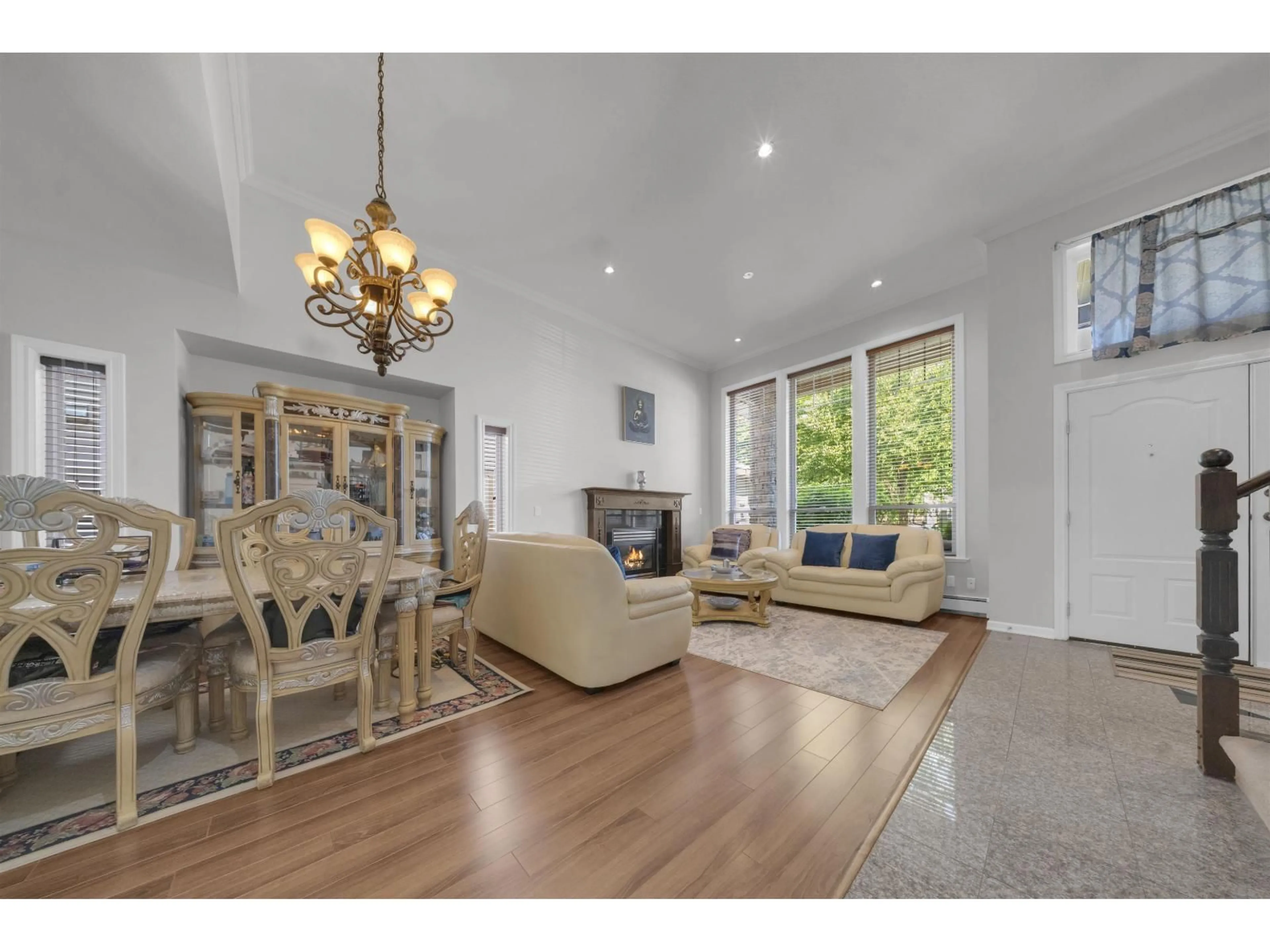Living room with furniture, wood/laminate floor for 17460 64A AVENUE, Surrey British Columbia V3S3K9