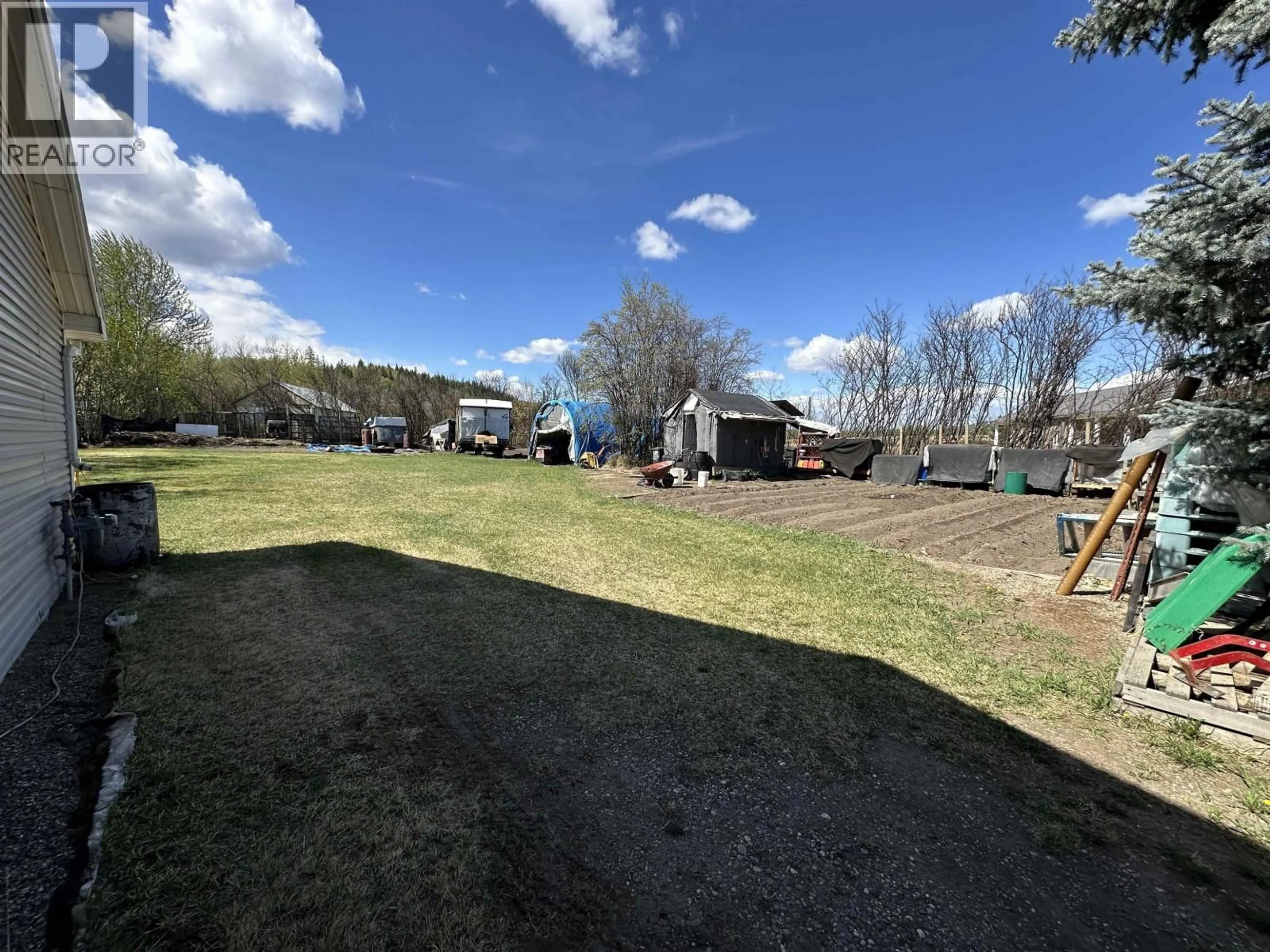 A pic from outside/outdoor area/front of a property/back of a property/a pic from drone, unknown for 2013 TAYLOR PARK SUBDIV, Fort St. John British Columbia V0C2K0