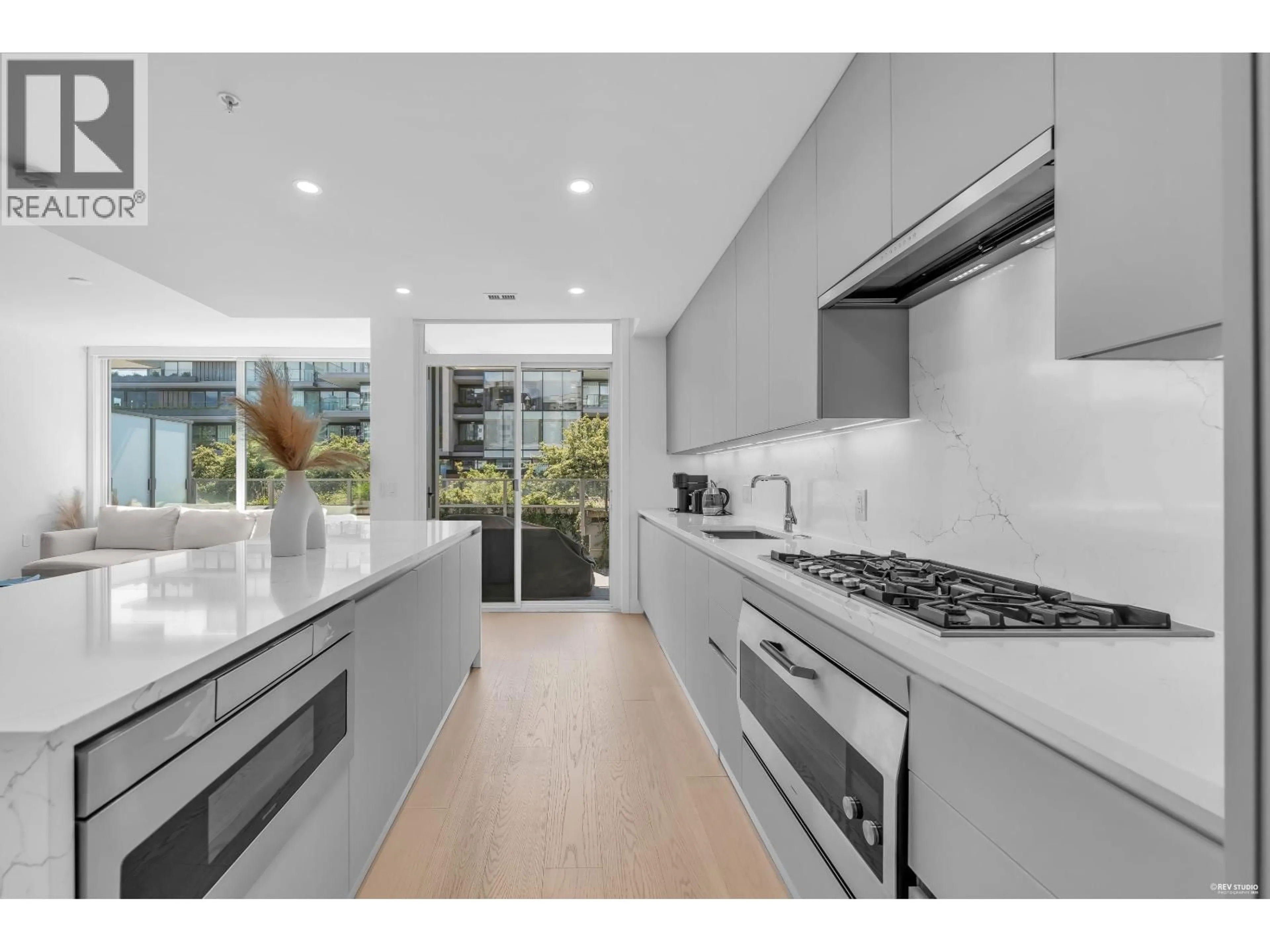 Open concept kitchen, unknown for 207 - 1331 MARINE DRIVE, West Vancouver British Columbia V7T1B6