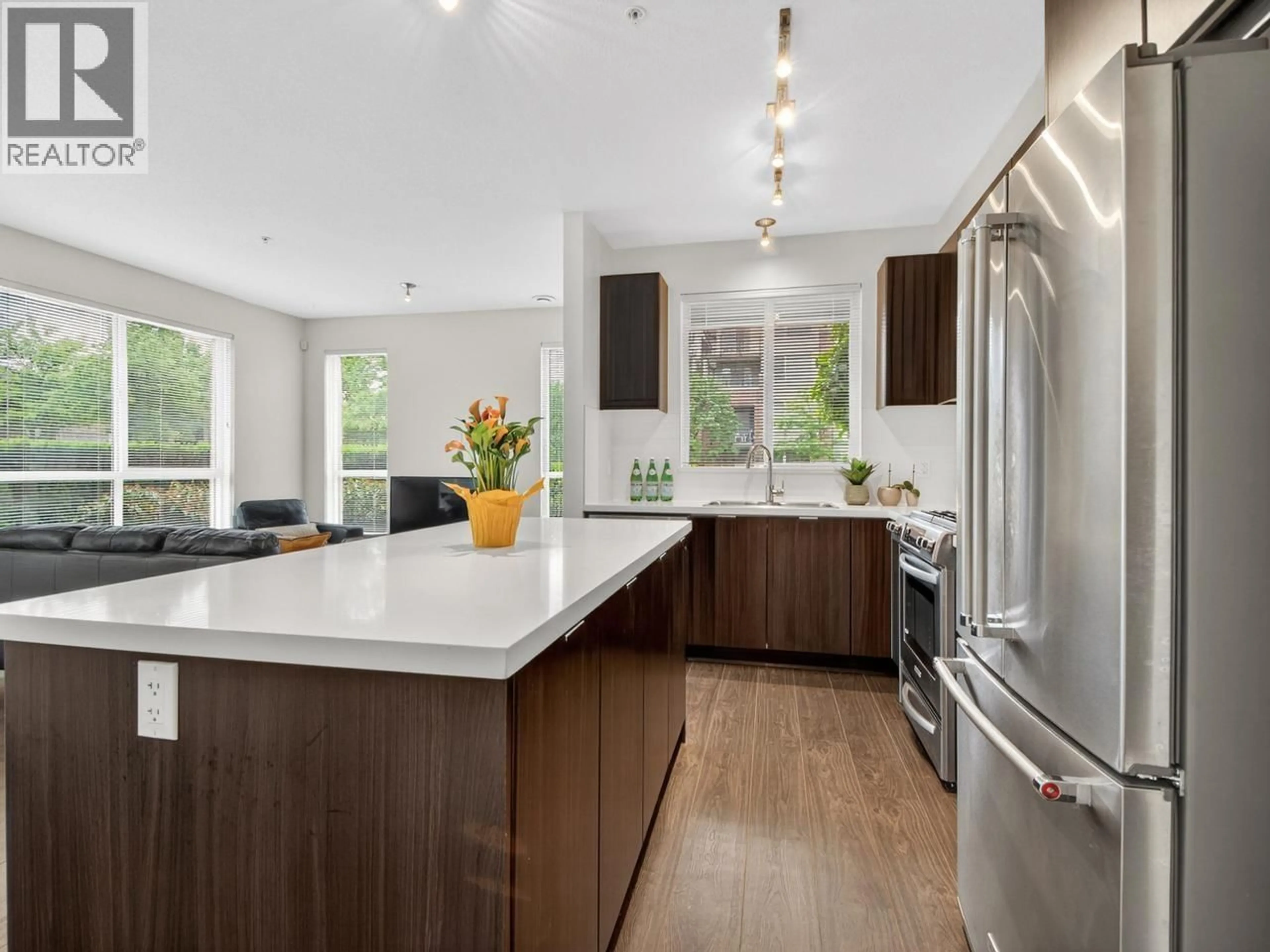 Contemporary kitchen, wood/laminate floor for 102 - 3107 WINDSOR GATE, Coquitlam British Columbia V3B0L1