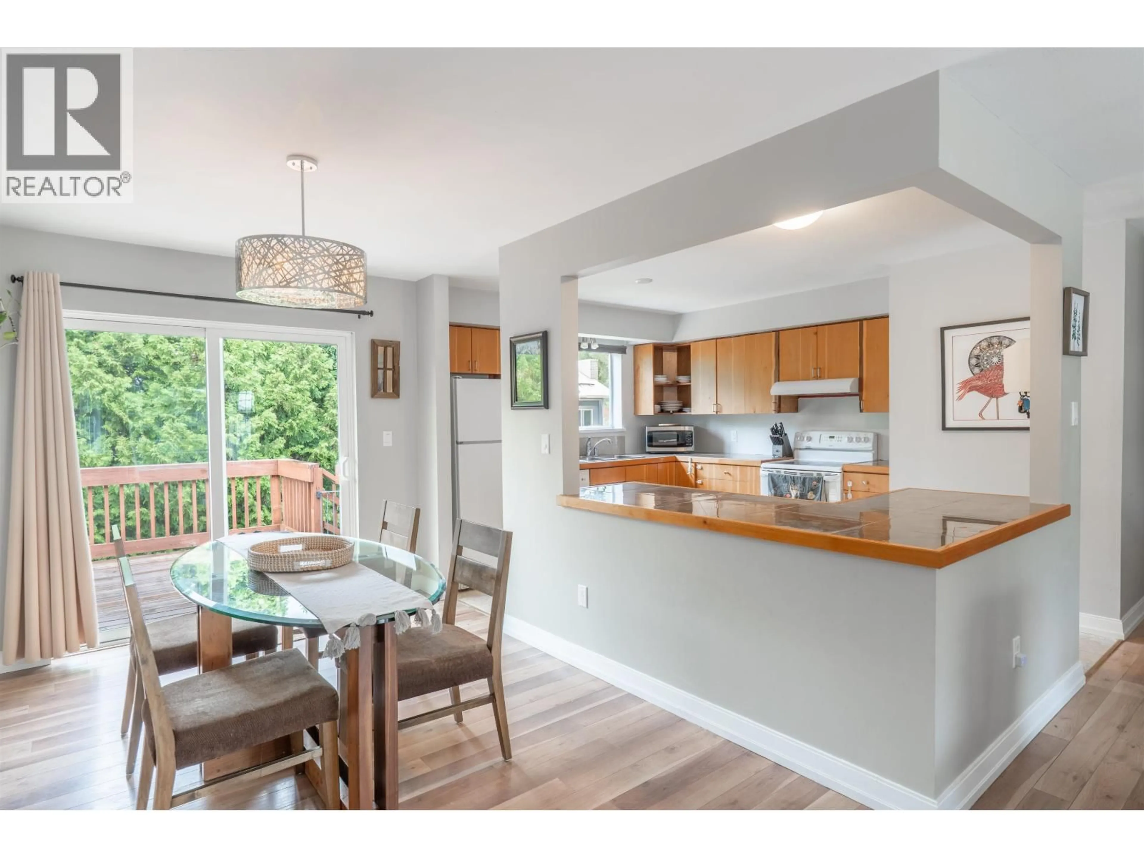 Open concept kitchen, wood/laminate floor for 1485 LUPIN STREET, Pemberton British Columbia V0N2L0