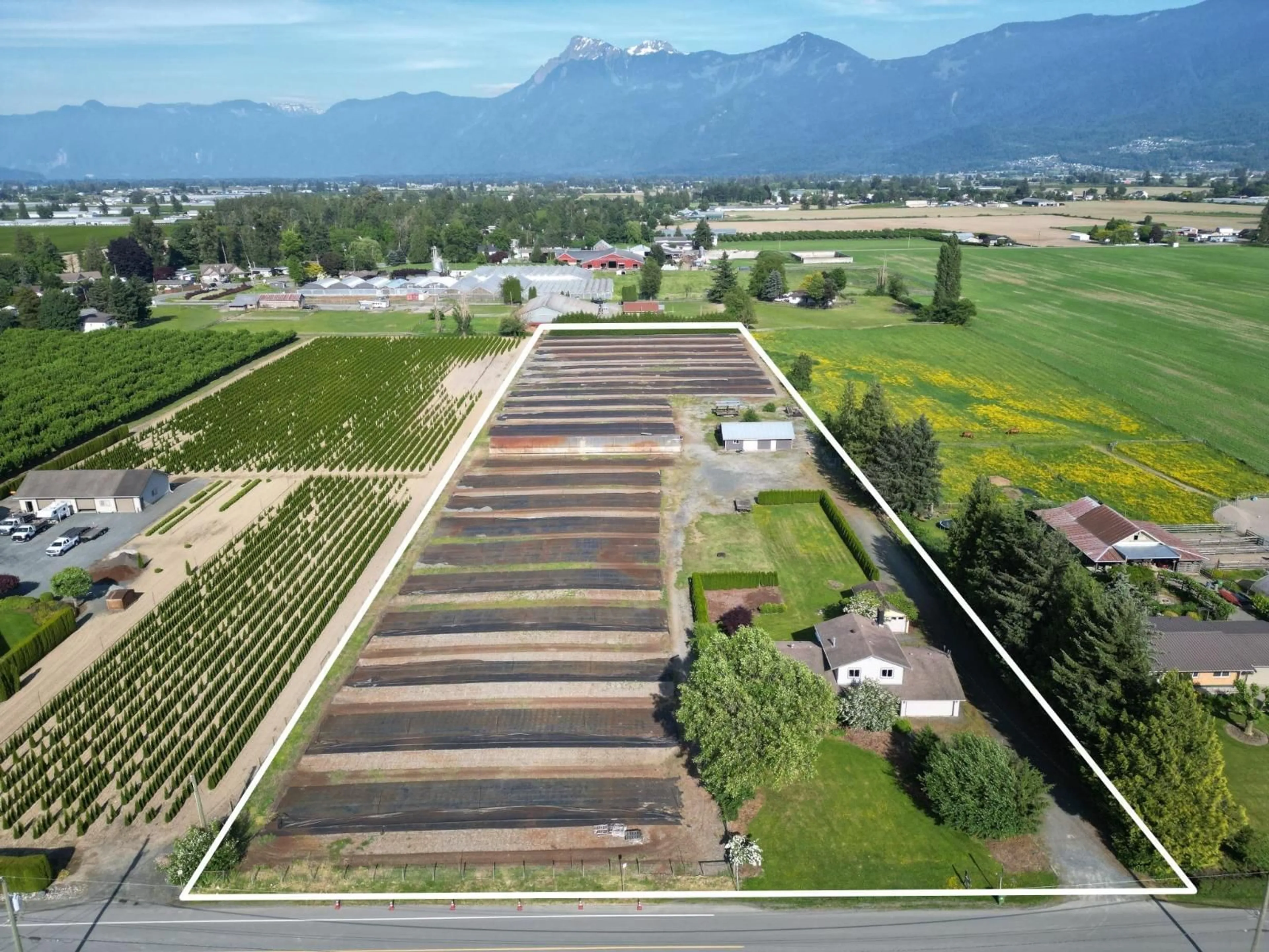 A pic from outside/outdoor area/front of a property/back of a property/a pic from drone, mountain view for 9850 BANFORD ROAD, Chilliwack British Columbia V2P6H3