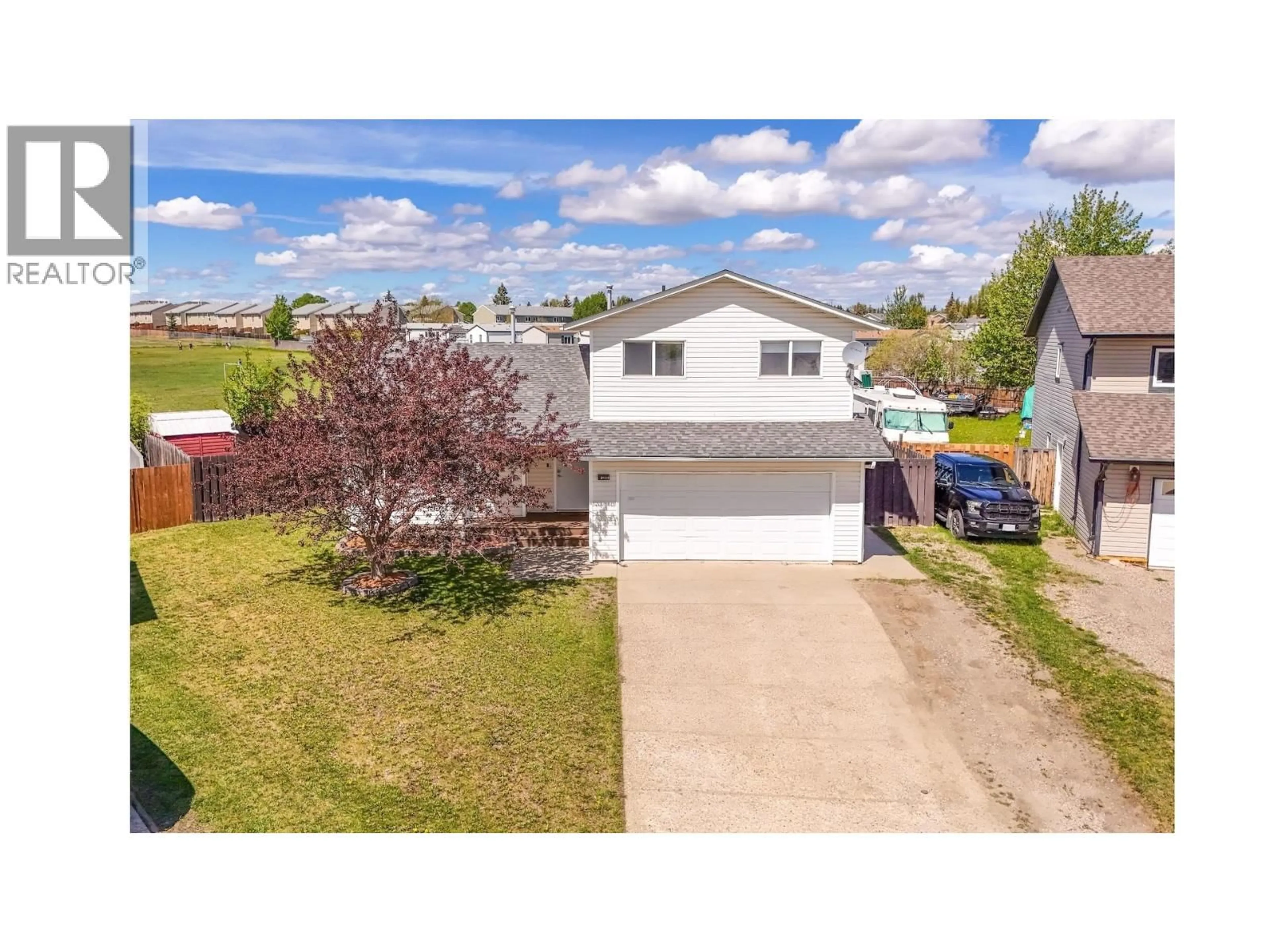 A pic from outside/outdoor area/front of a property/back of a property/a pic from drone, street for 8928 81A STREET, Fort St. John British Columbia V1J6X7