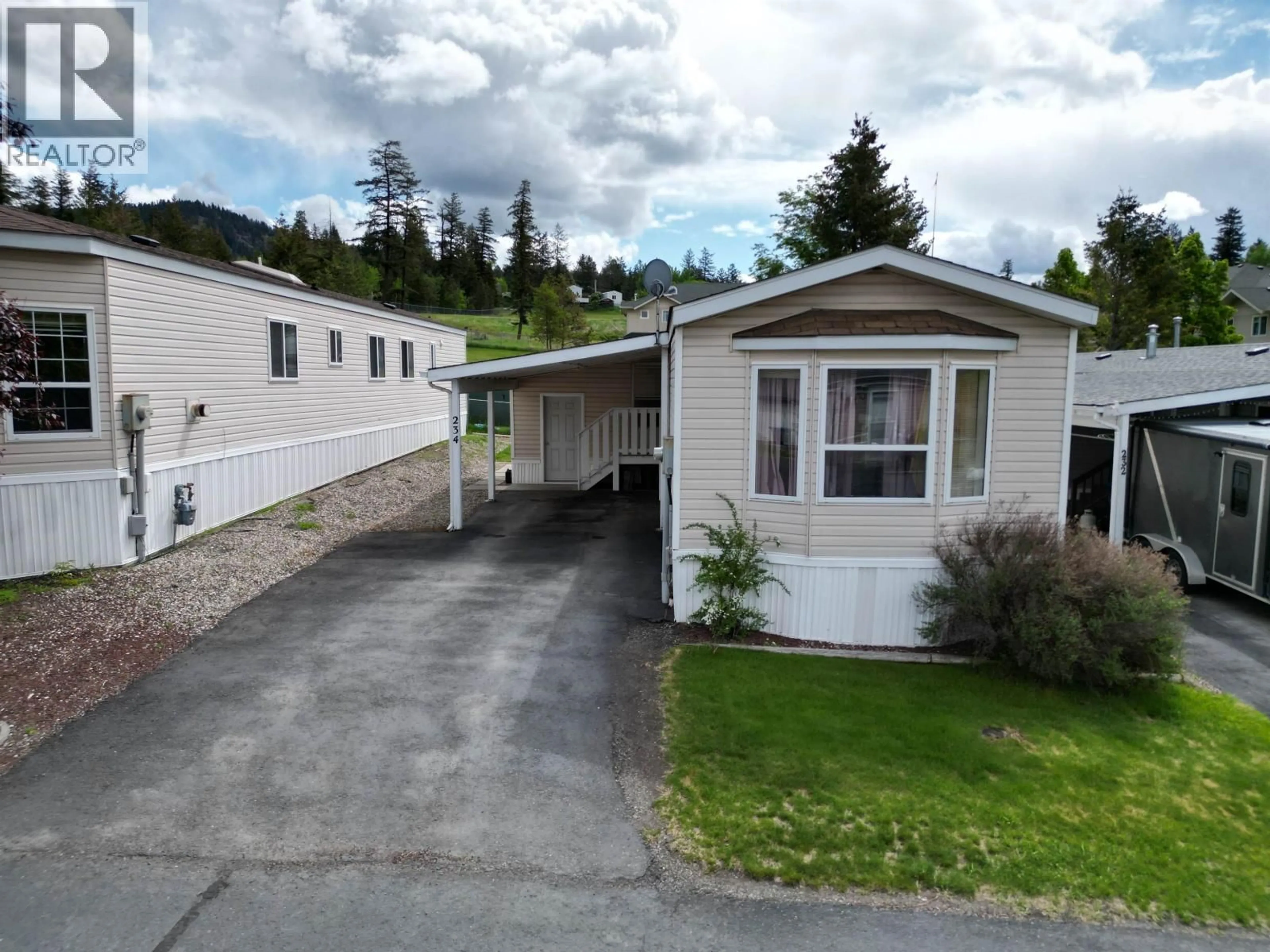 Home with vinyl exterior material, mountain view for 234 LONGHORN DRIVE, Williams Lake British Columbia V2G4T7