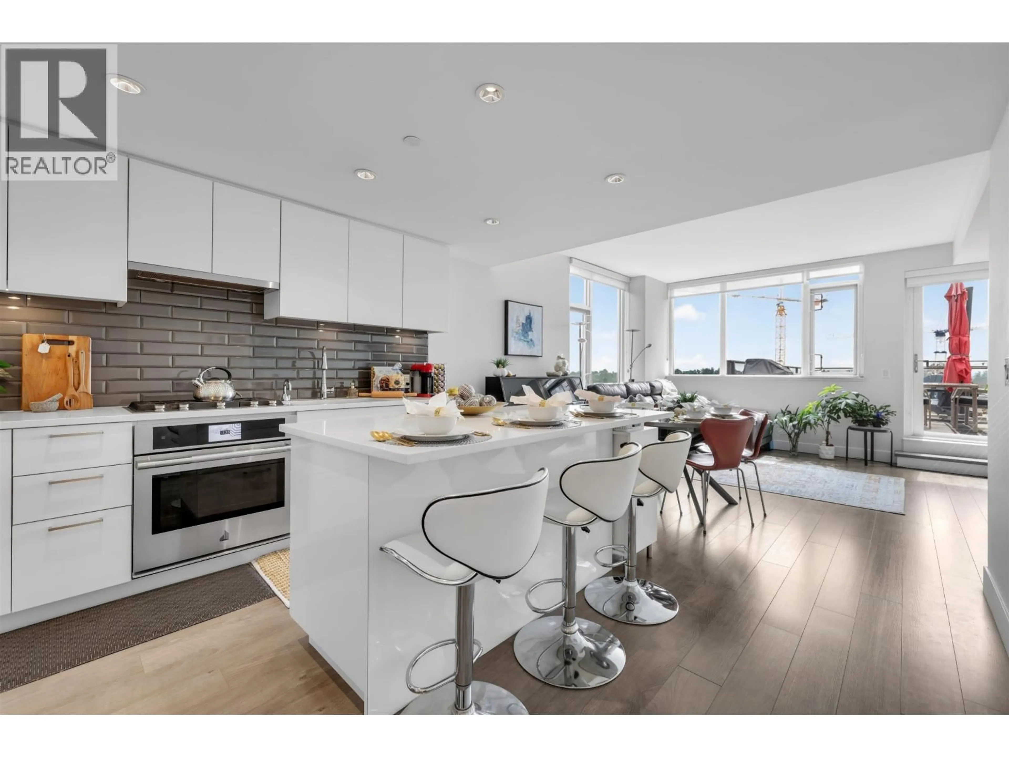 Open concept kitchen, unknown for 702 - 3451 SAWMILL CRESCENT, Vancouver British Columbia V5S0H3