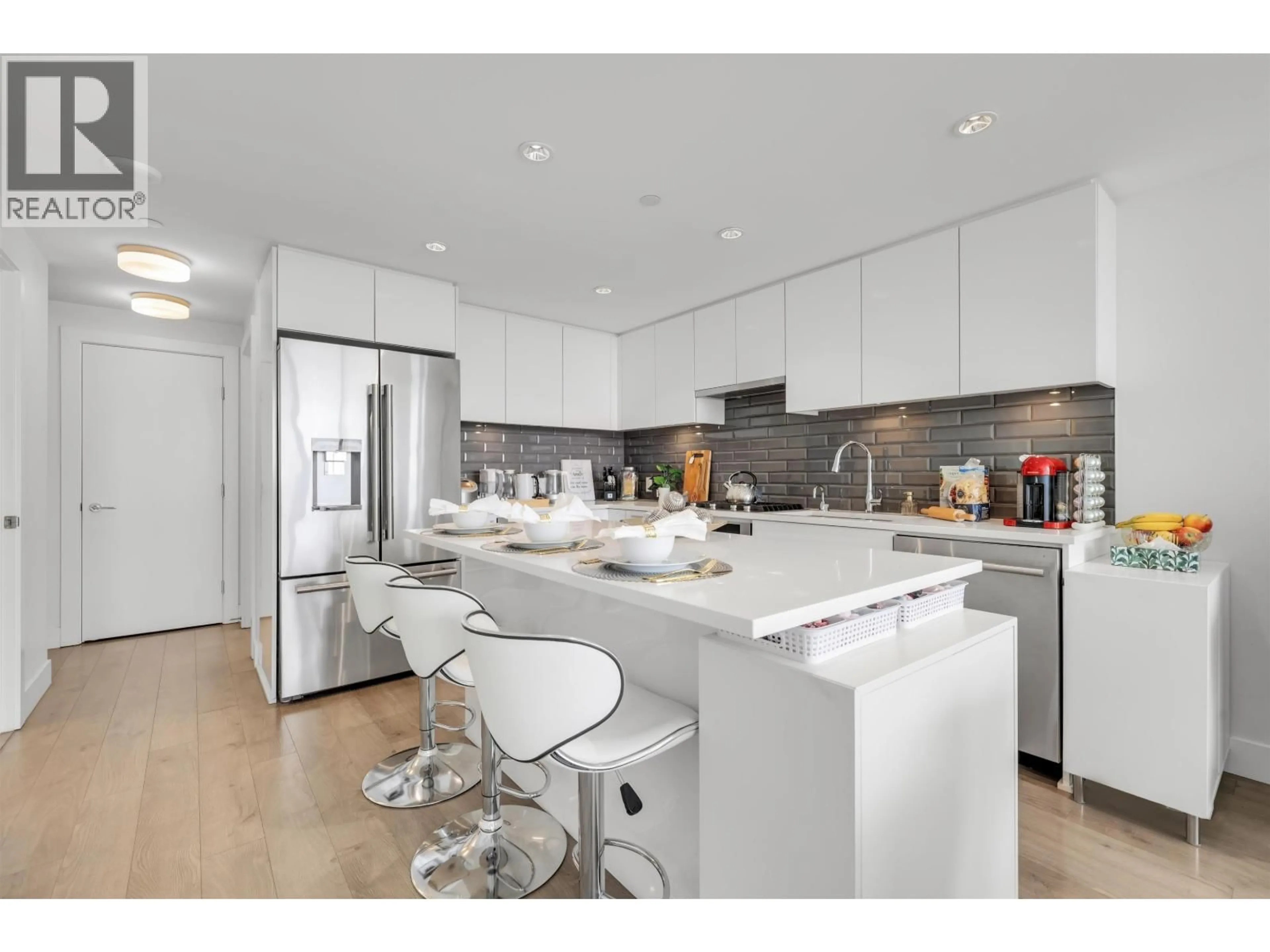 Open concept kitchen, unknown for 702 - 3451 SAWMILL CRESCENT, Vancouver British Columbia V5S0H3