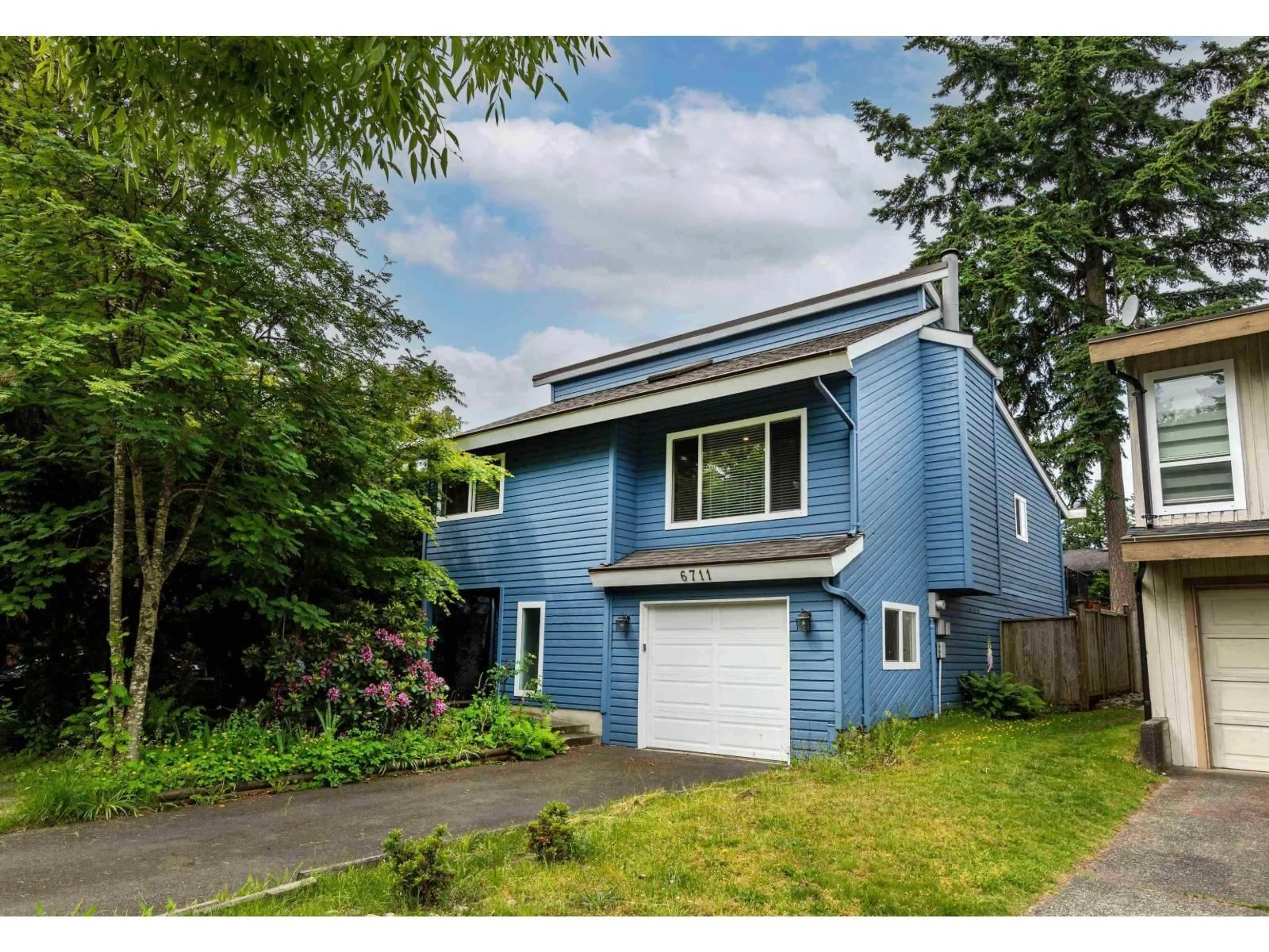 Home with vinyl exterior material, street for 6711 BAKER ROAD, Delta British Columbia V4E2T8