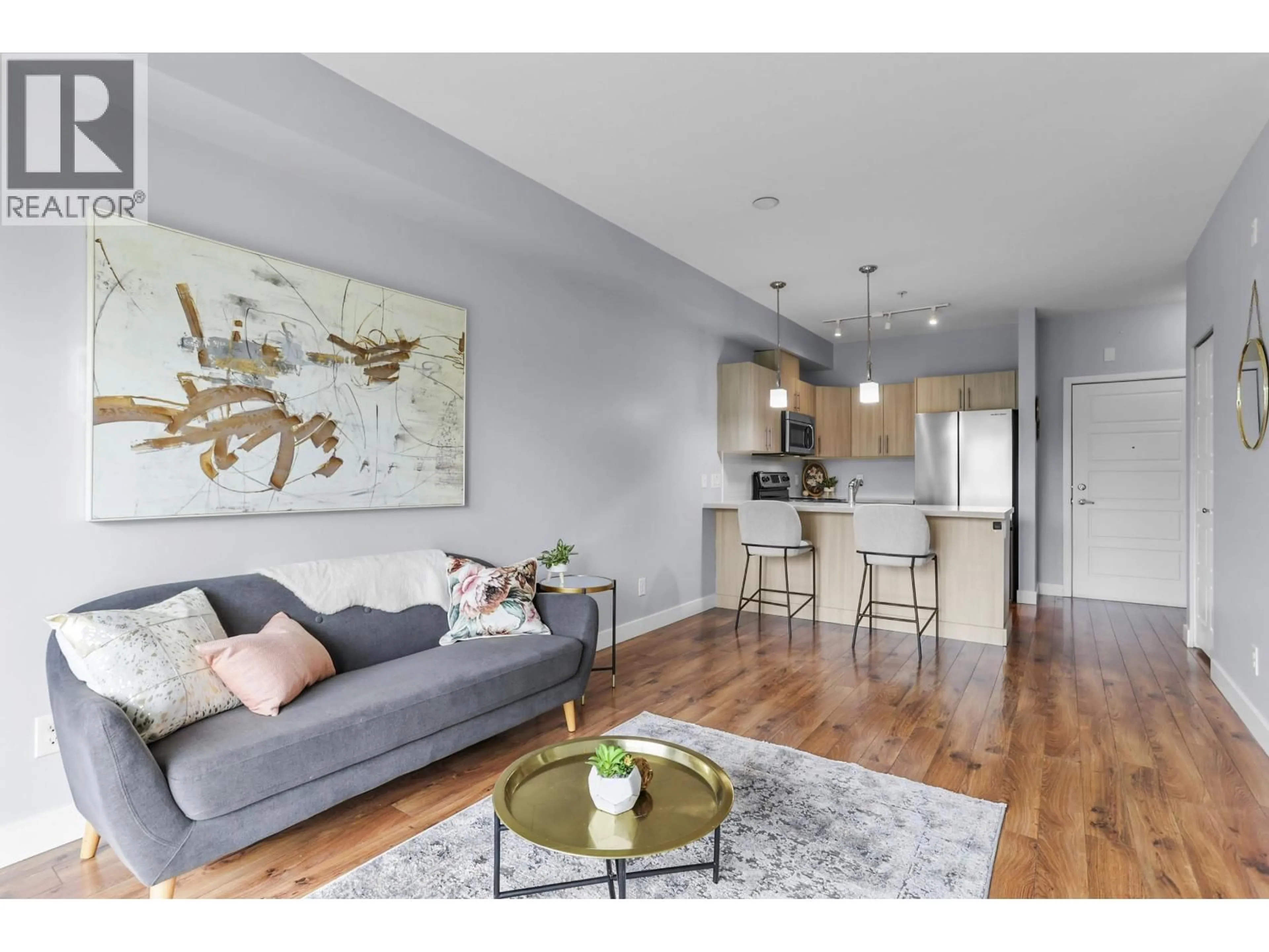 Living room with furniture, wood/laminate floor for 211 - 12070 227 STREET, Maple Ridge British Columbia V2X9H2