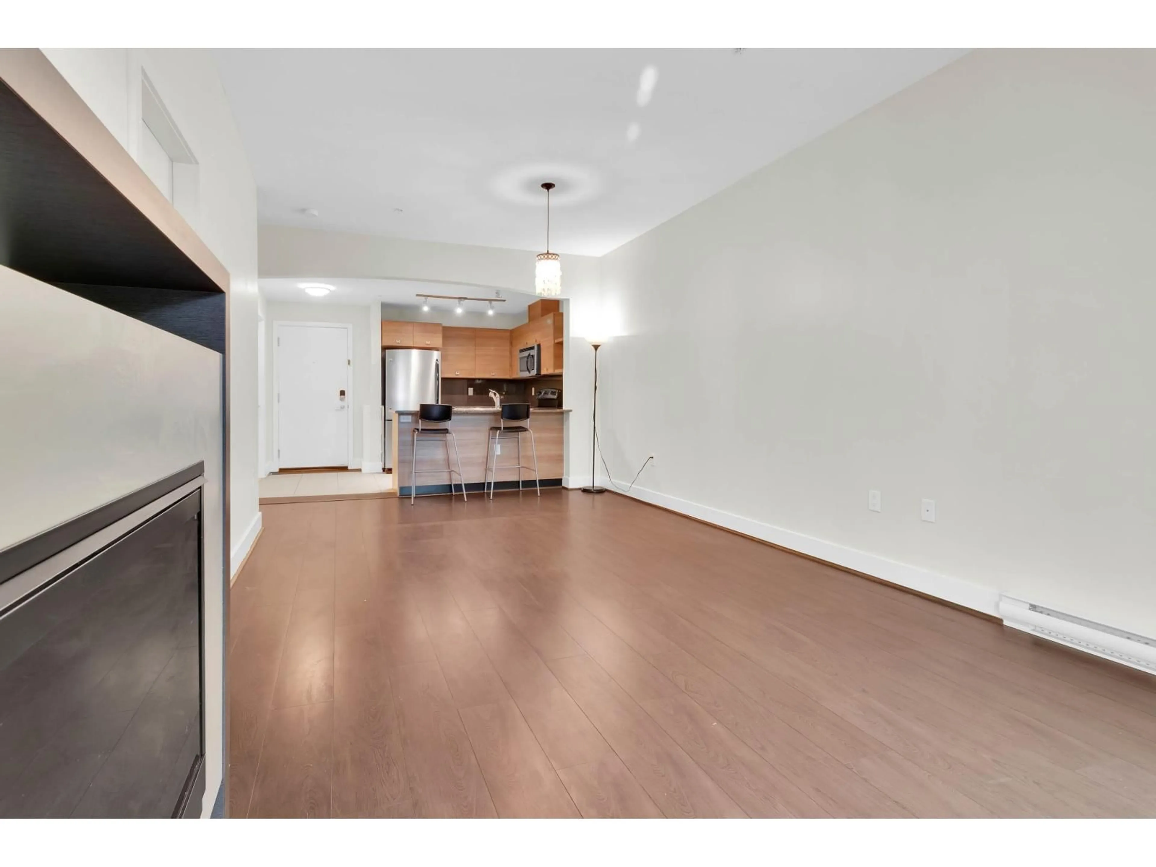 Open concept kitchen, unknown for 323 - 6688 120 STREET, Surrey British Columbia V3W1T8