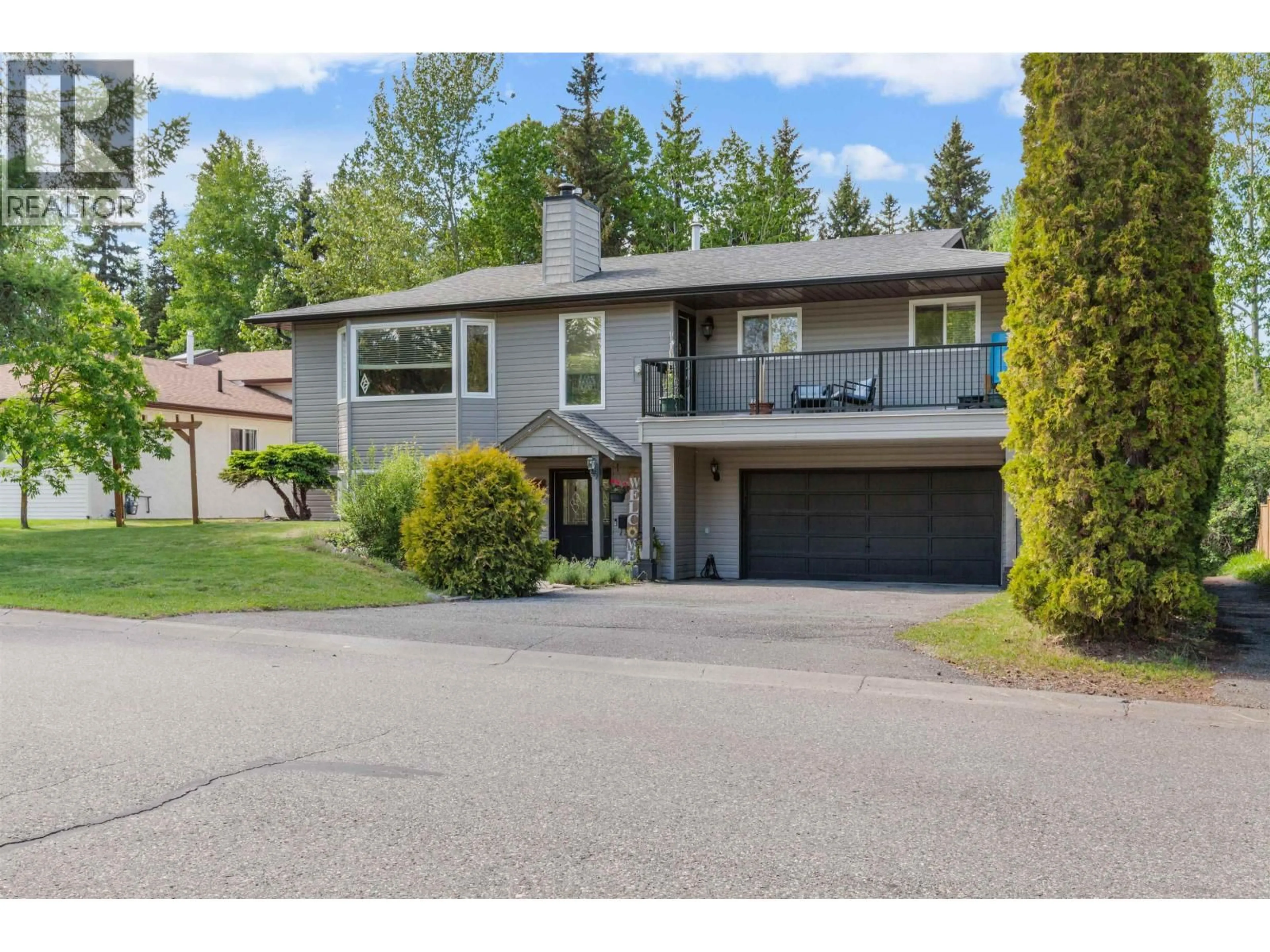 Home with vinyl exterior material, street for 8264 ST JOHN CRESCENT, Prince George British Columbia V2N4H8