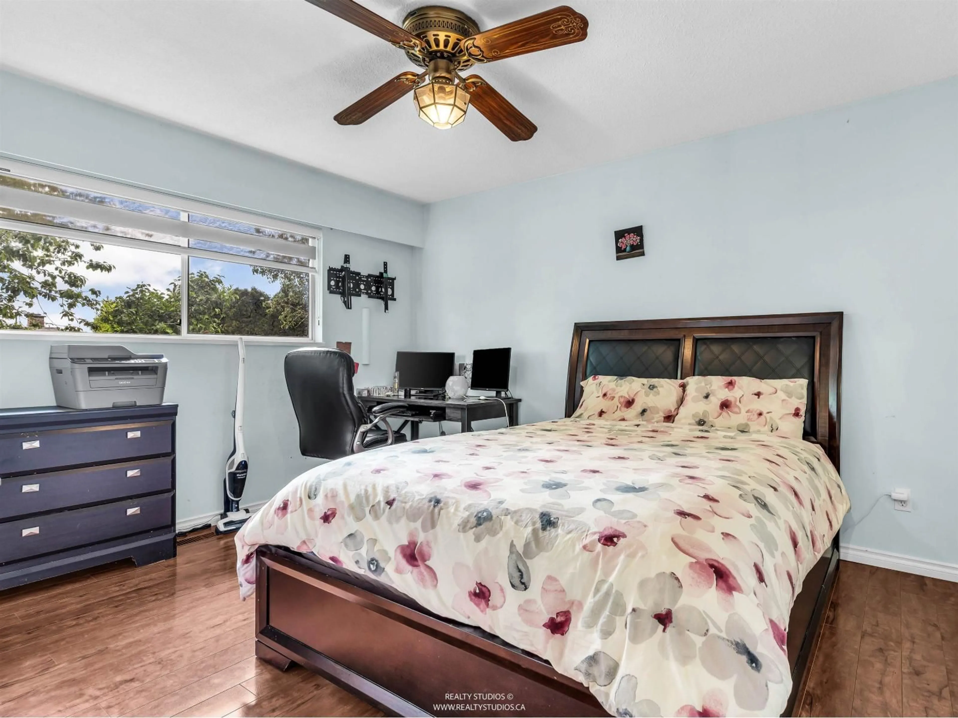 Bedroom with bed, wood/laminate floor for 7735 112 STREET, Delta British Columbia V4C4V9