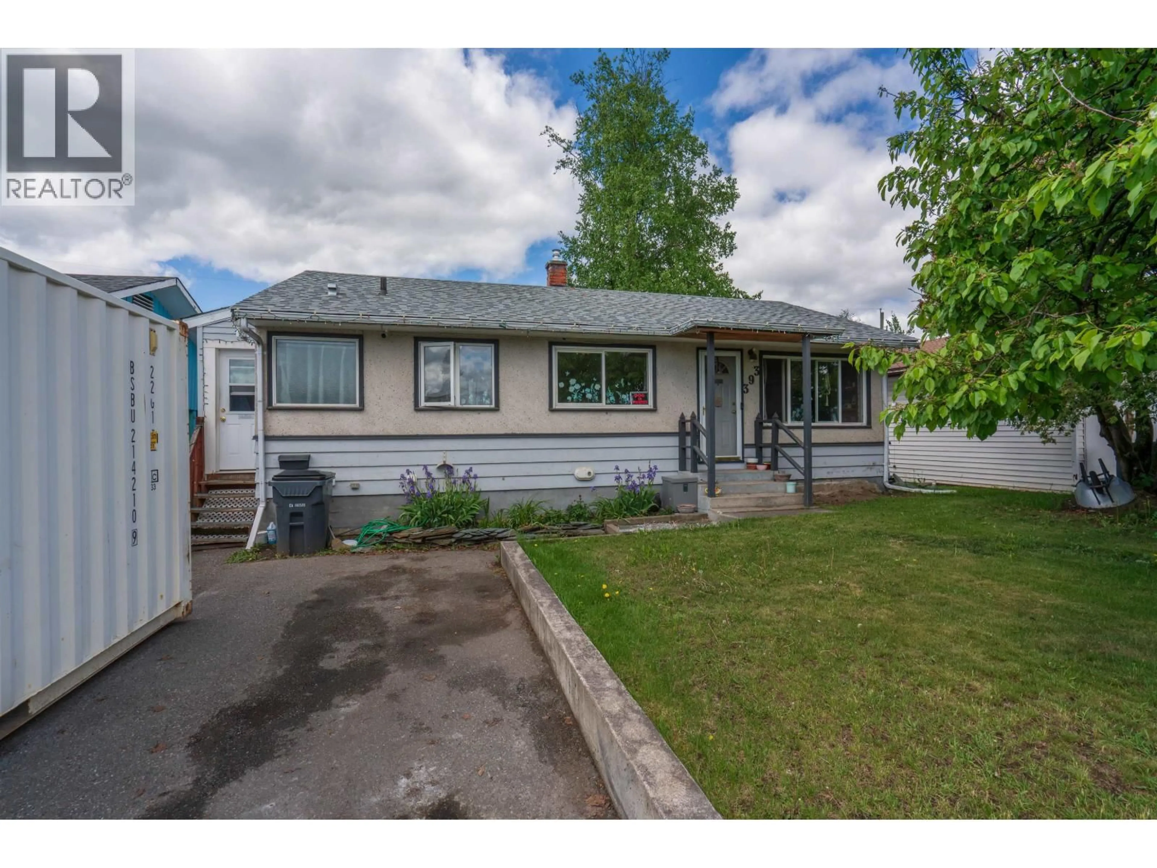 Home with vinyl exterior material, street for 393 IRWIN STREET, Prince George British Columbia V2M2X4