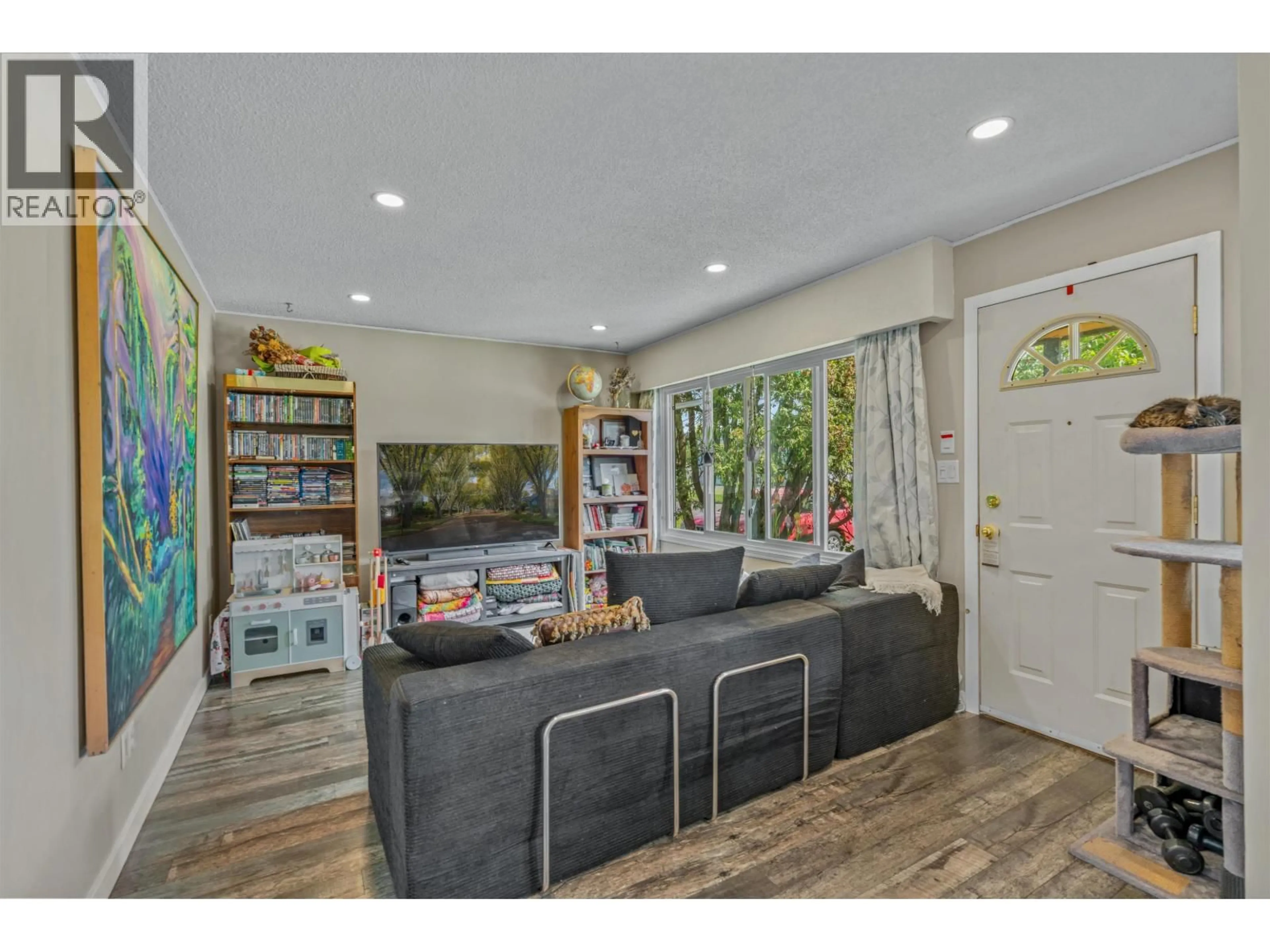 Living room with furniture, unknown for 393 IRWIN STREET, Prince George British Columbia V2M2X4