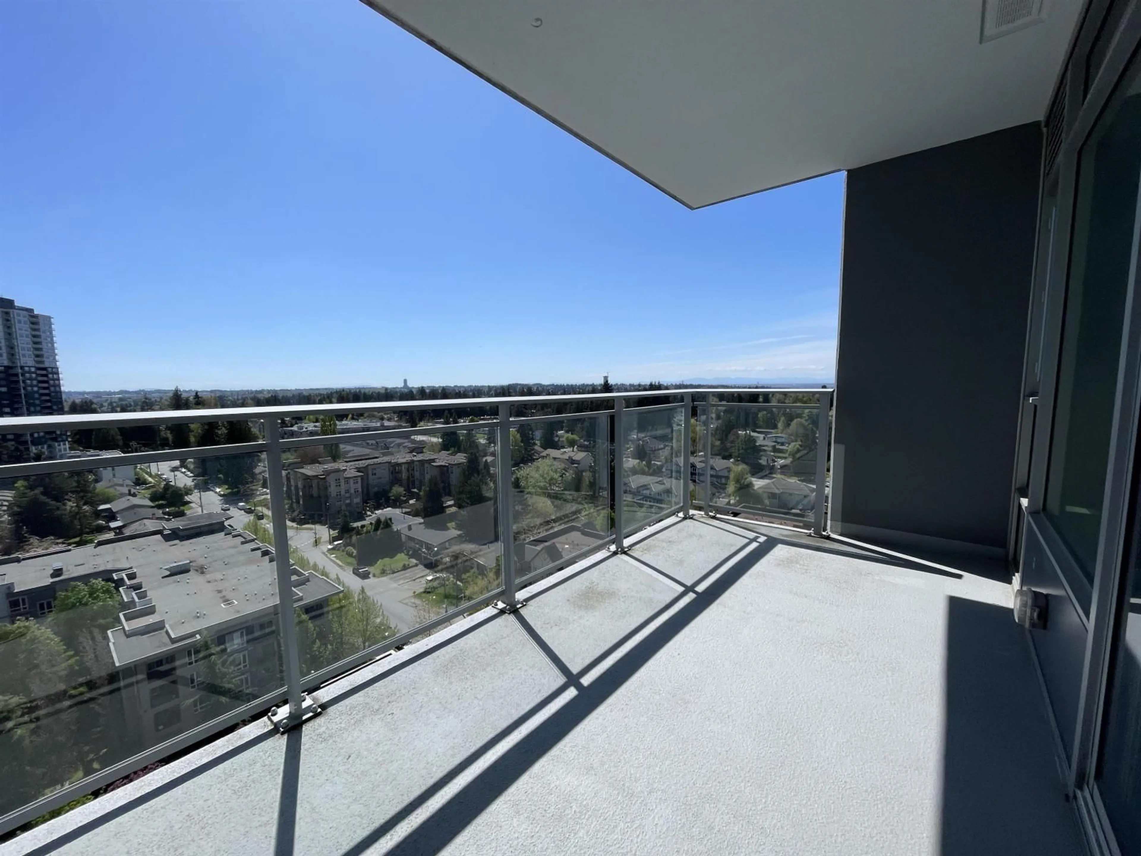 Balcony in the apartment, city buildings view from balcony for 1507 - 13308 CENTRAL AVENUE, Surrey British Columbia V3T0M4