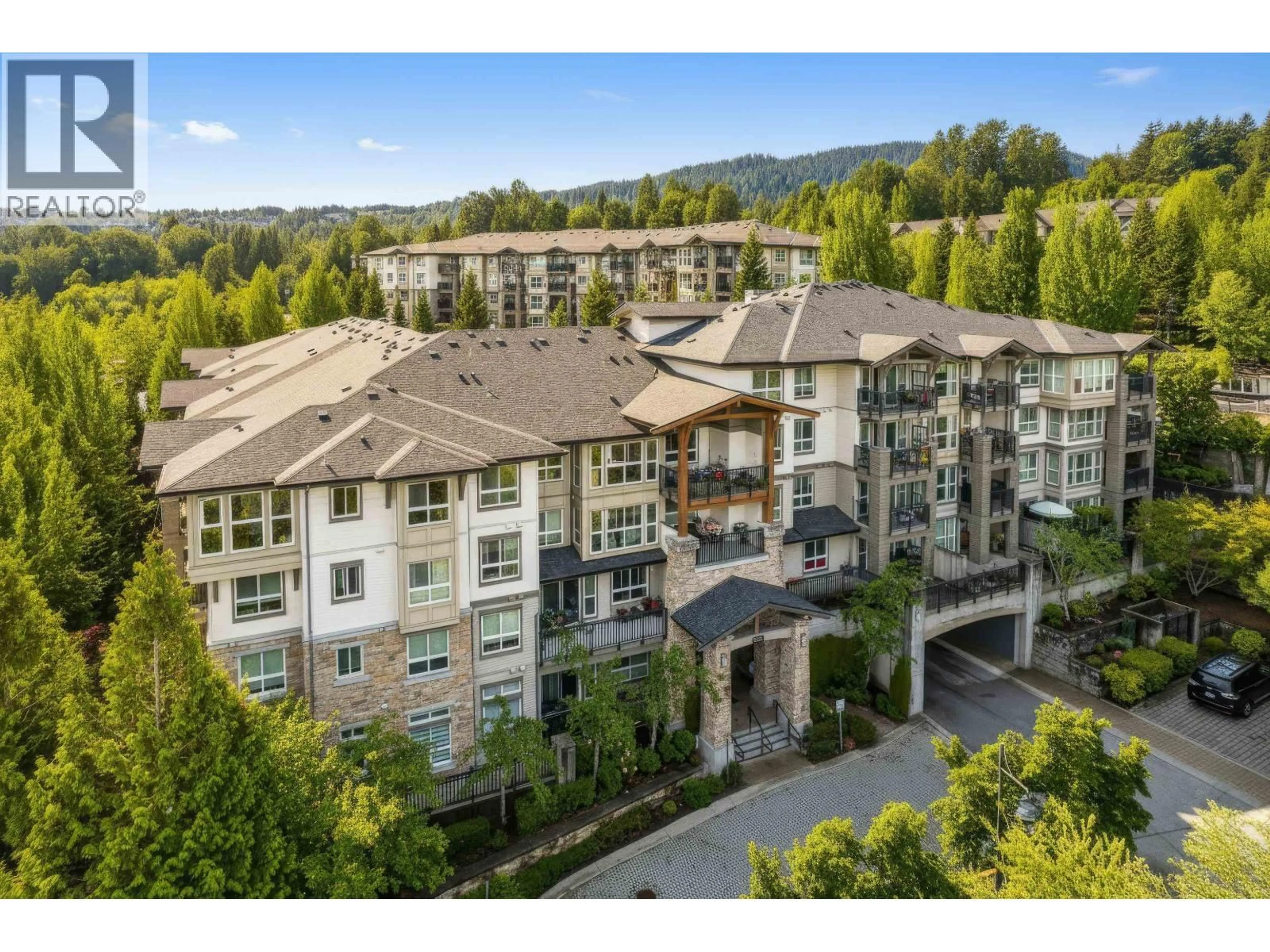 A pic from outside/outdoor area/front of a property/back of a property/a pic from drone, mountain view for 105 - 1330 GENEST WAY WAY, Coquitlam British Columbia V3E0A4