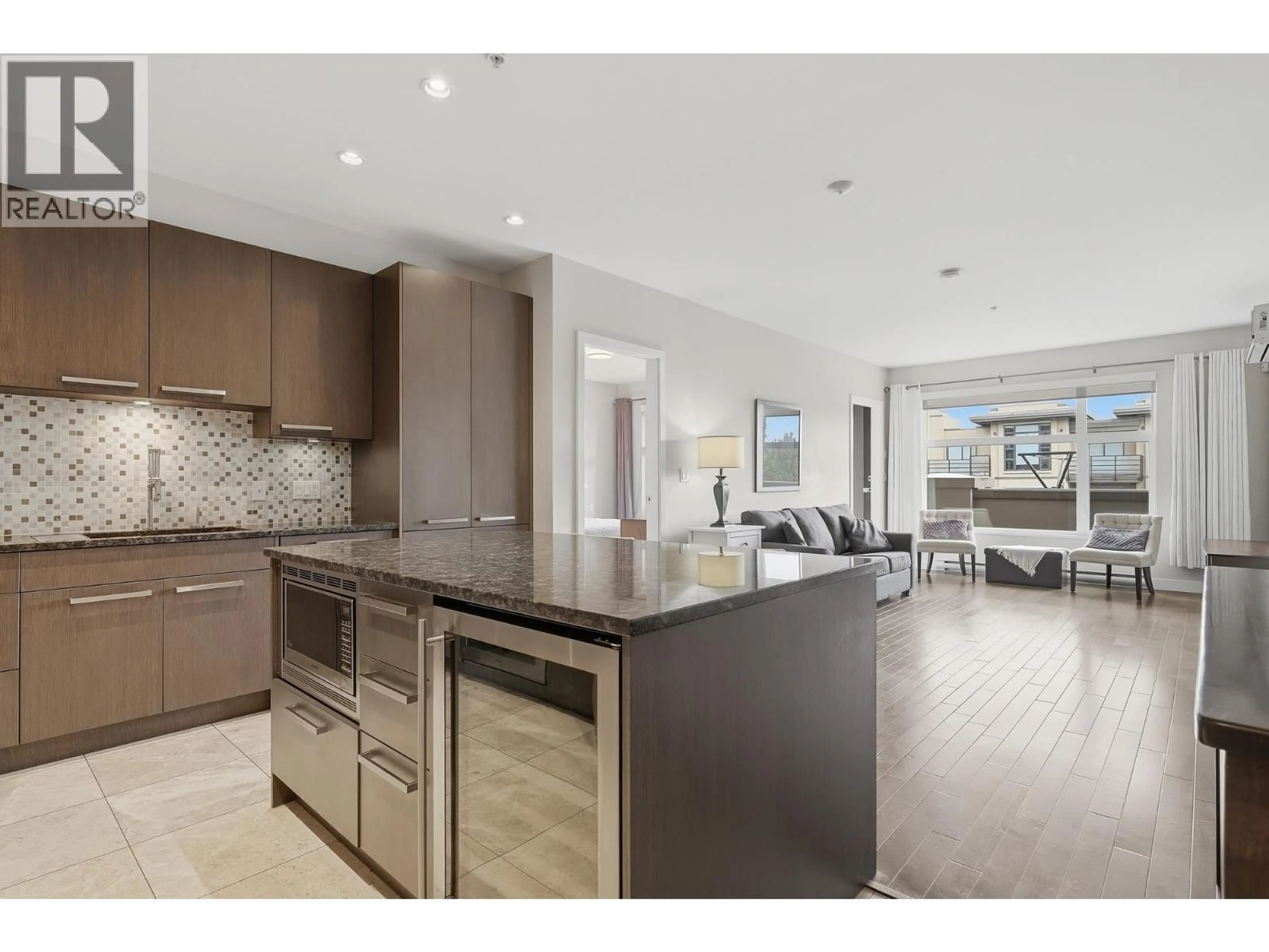Open concept kitchen, ceramic/tile floor for 305 - 4570 HASTINGS STREET, Burnaby British Columbia V5C0E8
