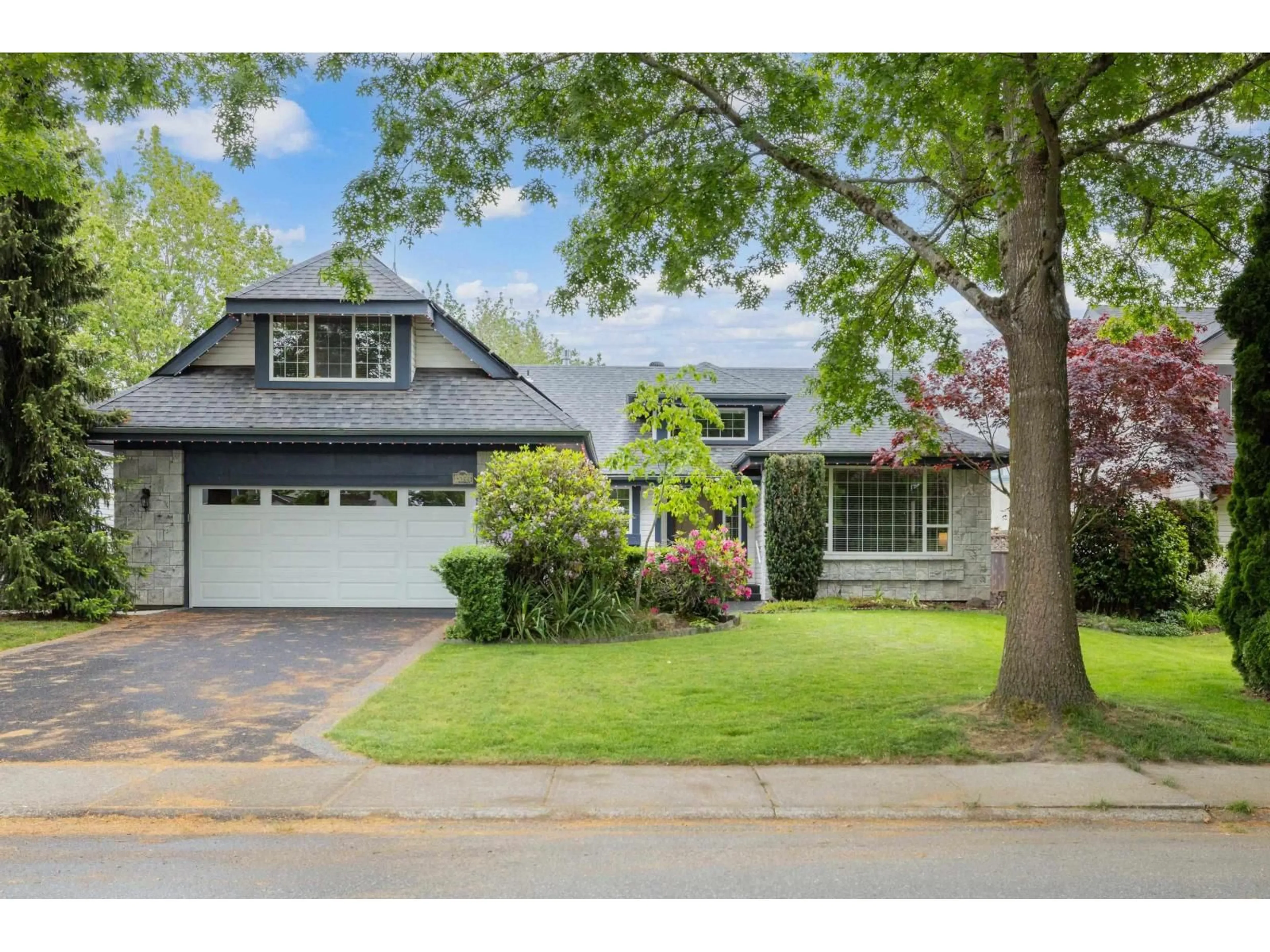 Home with vinyl exterior material, street for 4522 221A STREET, Langley British Columbia V2Z1B5