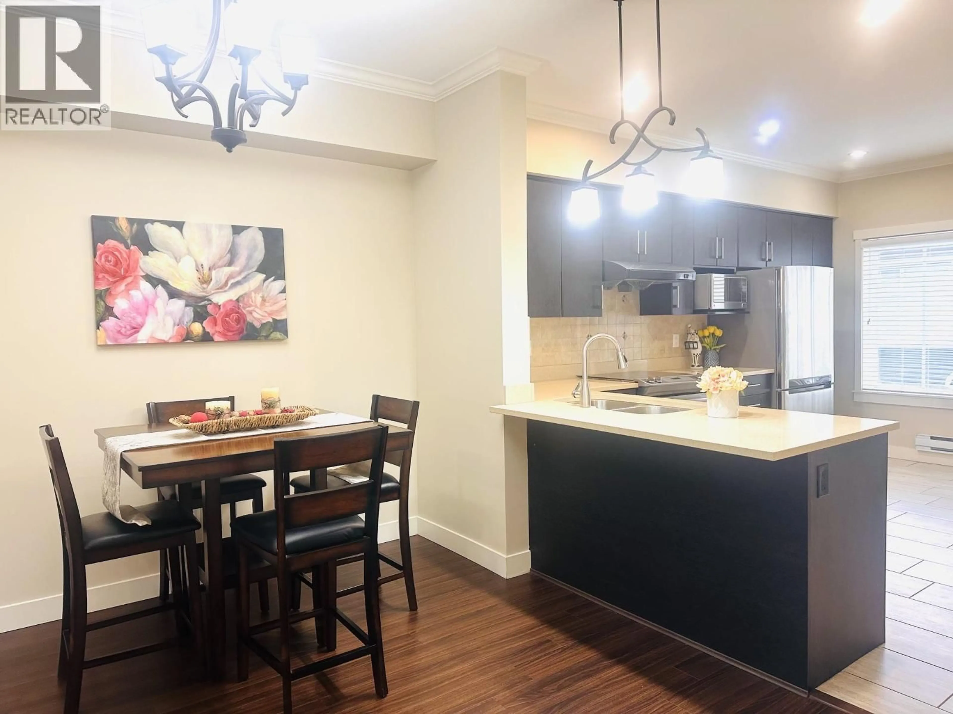 Open concept kitchen, wood/laminate floor for 16 - 9811 FERNDALE ROAD, Richmond British Columbia V6Y1X4