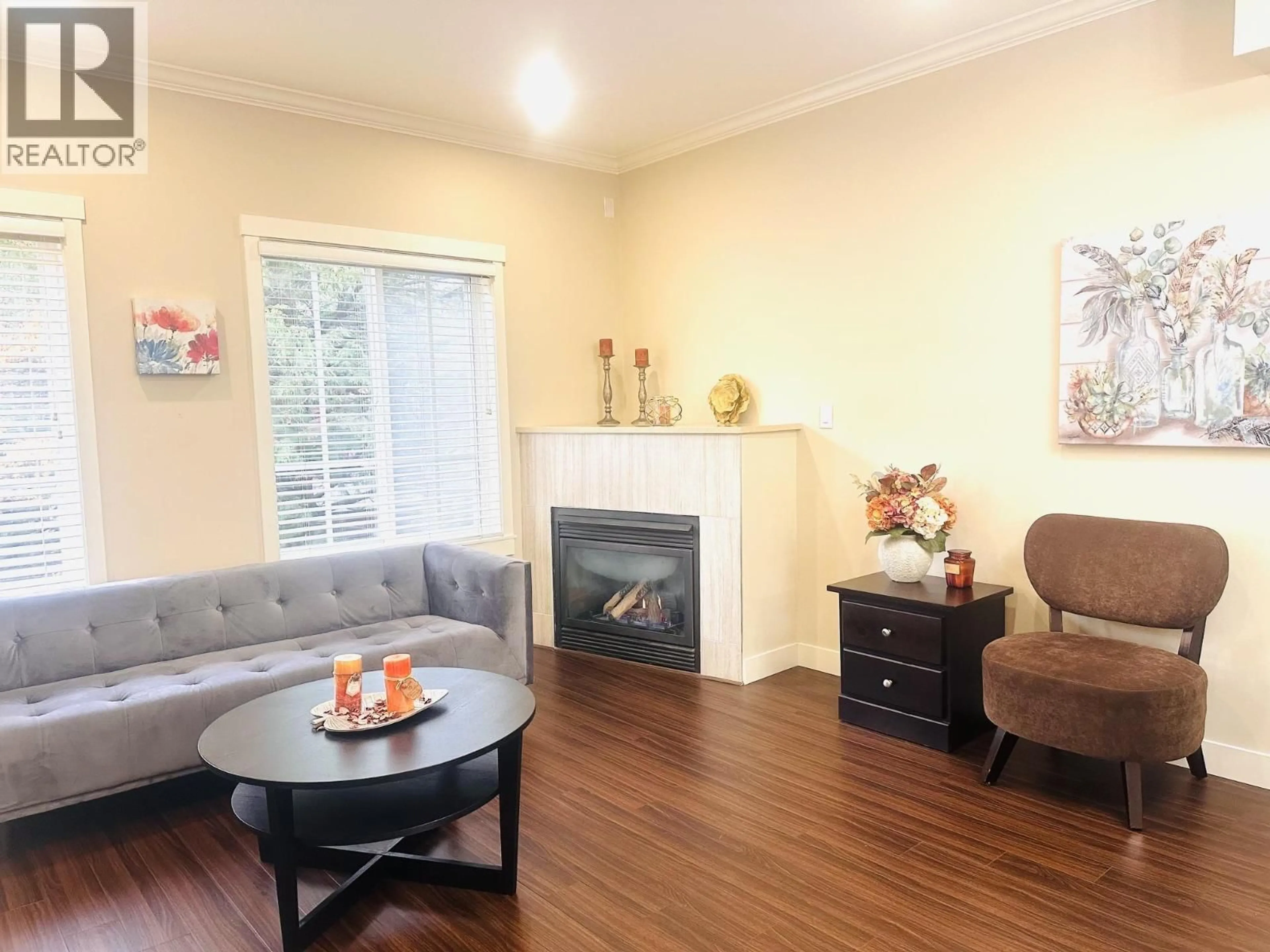 Living room with furniture, wood/laminate floor for 16 - 9811 FERNDALE ROAD, Richmond British Columbia V6Y1X4