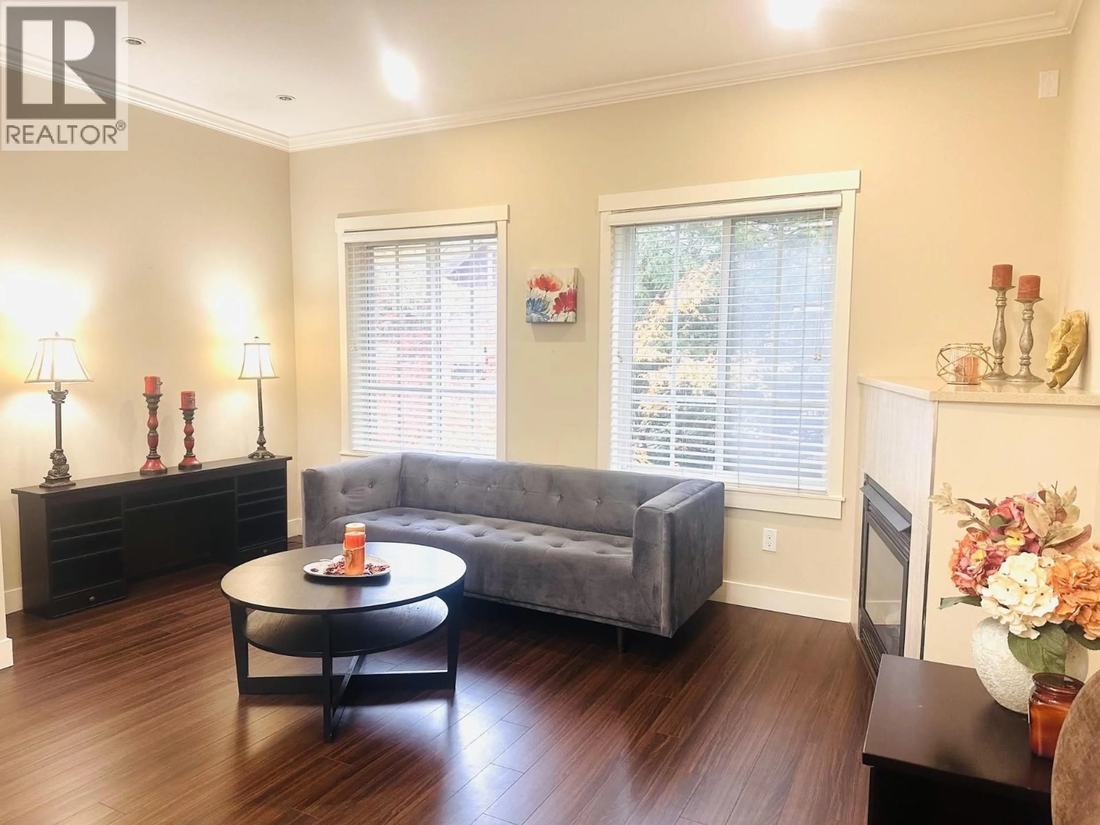 Living room with furniture, wood/laminate floor for 16 - 9811 FERNDALE ROAD, Richmond British Columbia V6Y1X4