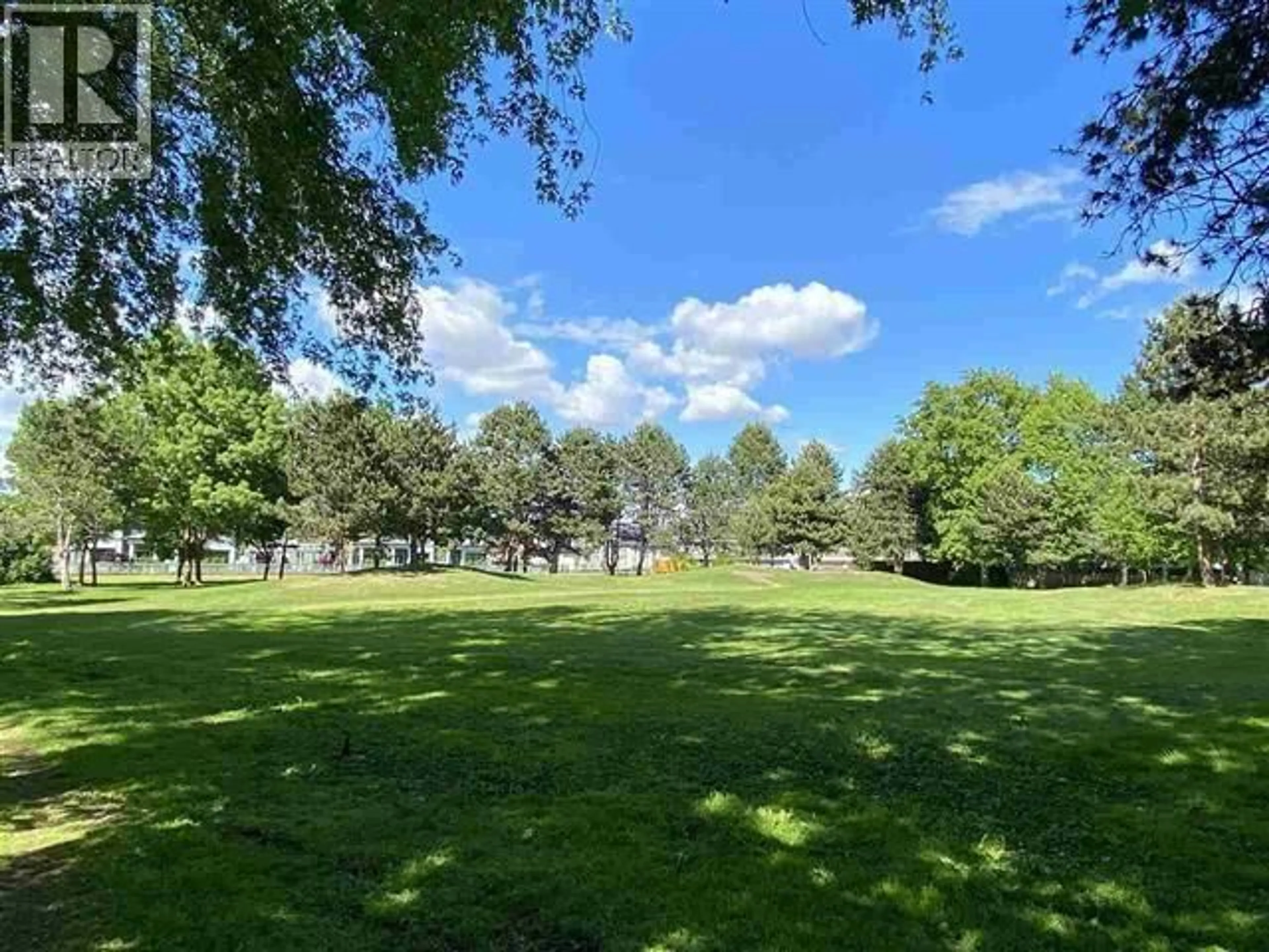 A pic from outside/outdoor area/front of a property/back of a property/a pic from drone, forest/trees view for 205 - 7240 LINDSAY ROAD, Richmond British Columbia V7C3M6