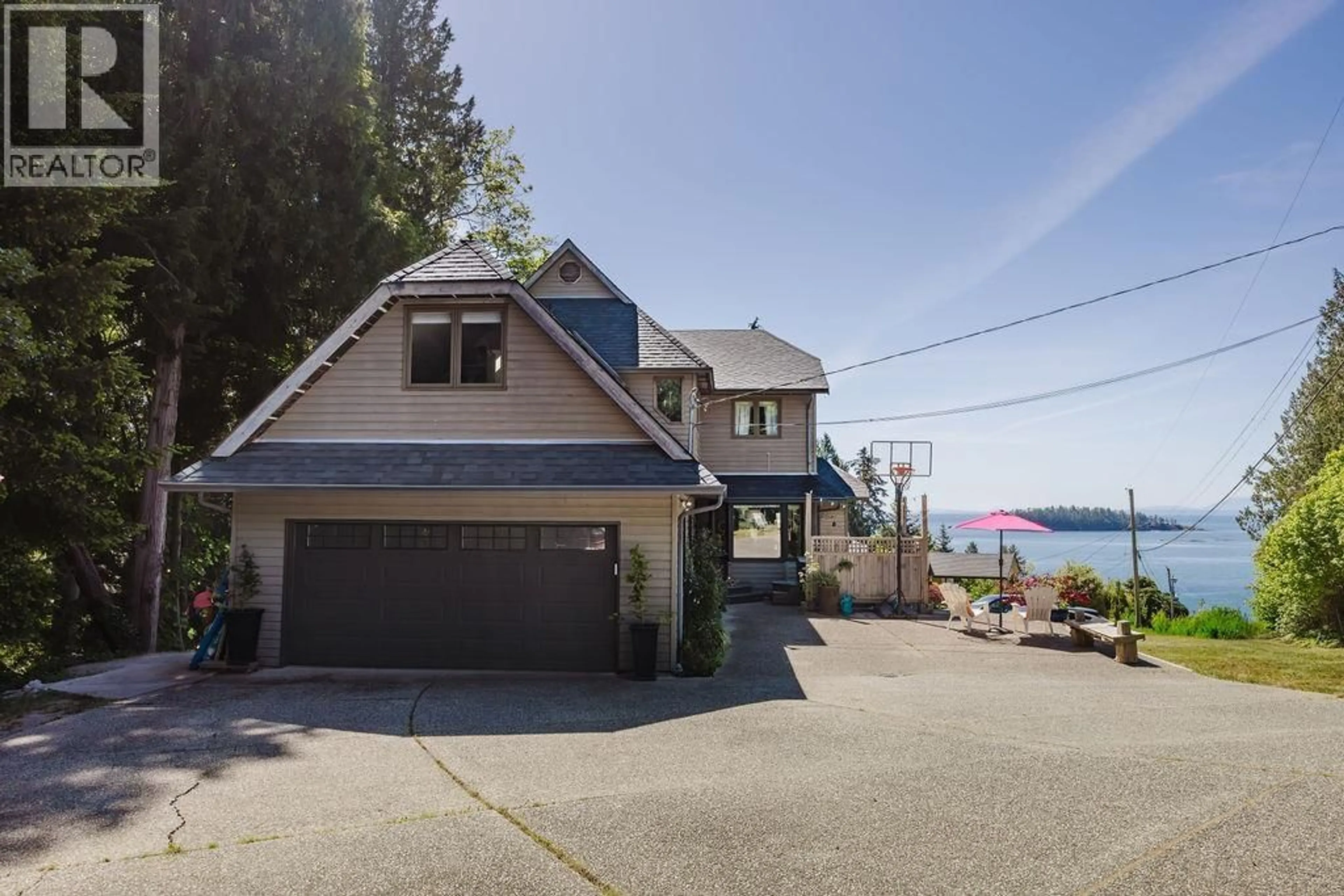A pic from outside/outdoor area/front of a property/back of a property/a pic from drone, water/lake/river/ocean view for 5454 WAKEFIELD ROAD, Sechelt British Columbia V0N3A8