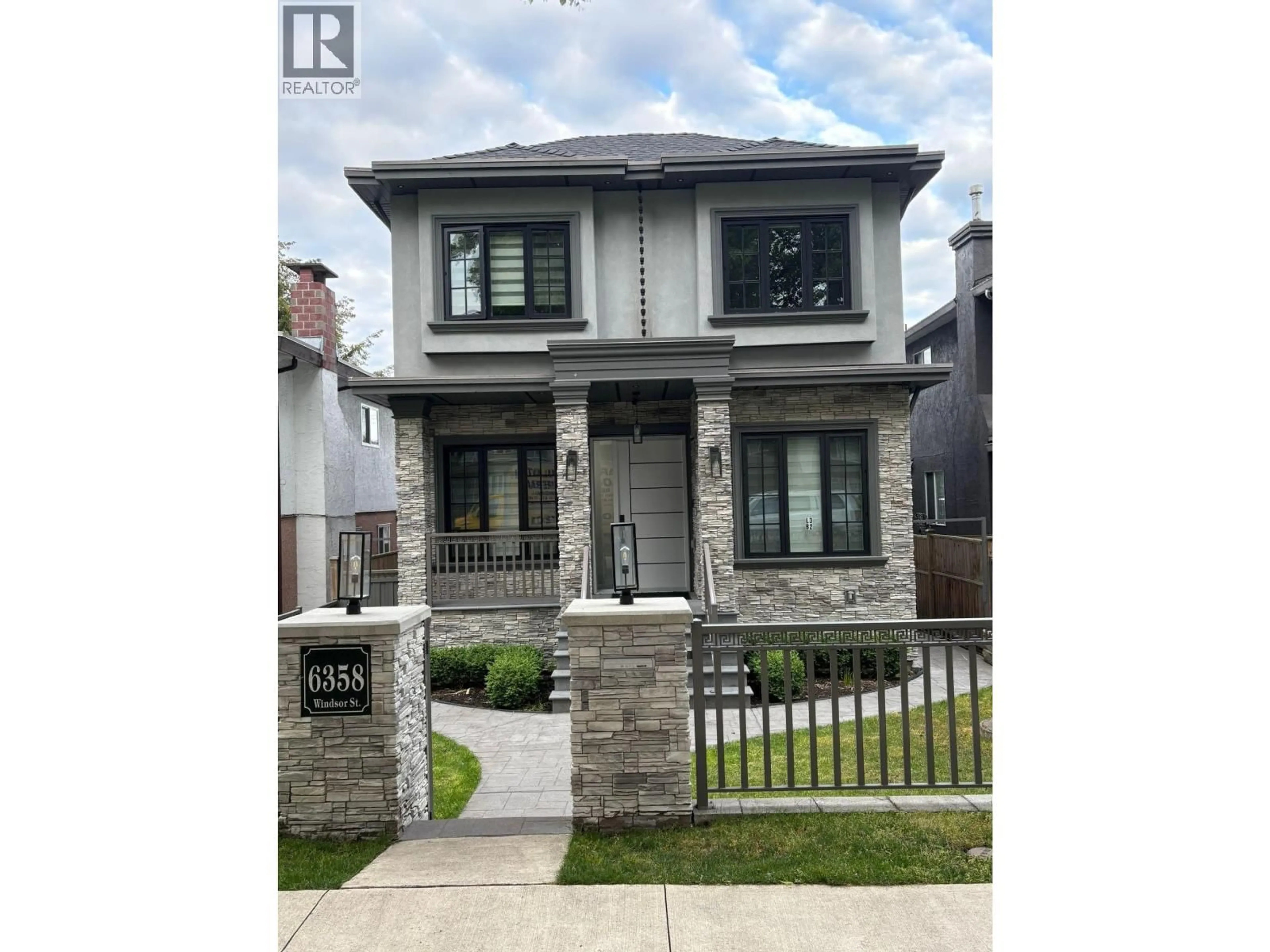 Home with brick exterior material, street for 1 - 6358 WINDSOR STREET, Vancouver British Columbia V5W3J5
