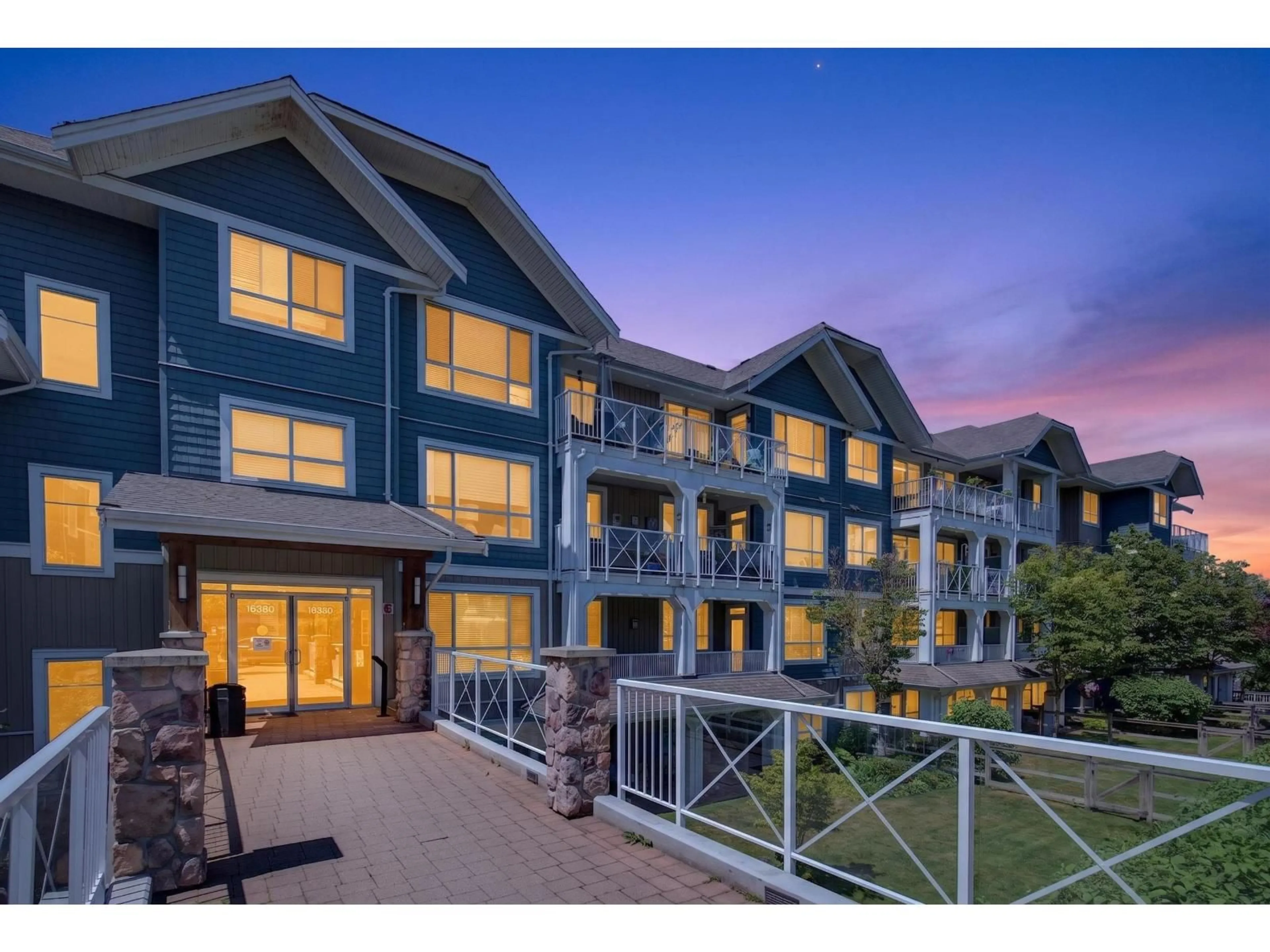 A pic from outside/outdoor area/front of a property/back of a property/a pic from drone, mountain view for 406 - 16380 64 AVENUE, Surrey British Columbia V3S6X6