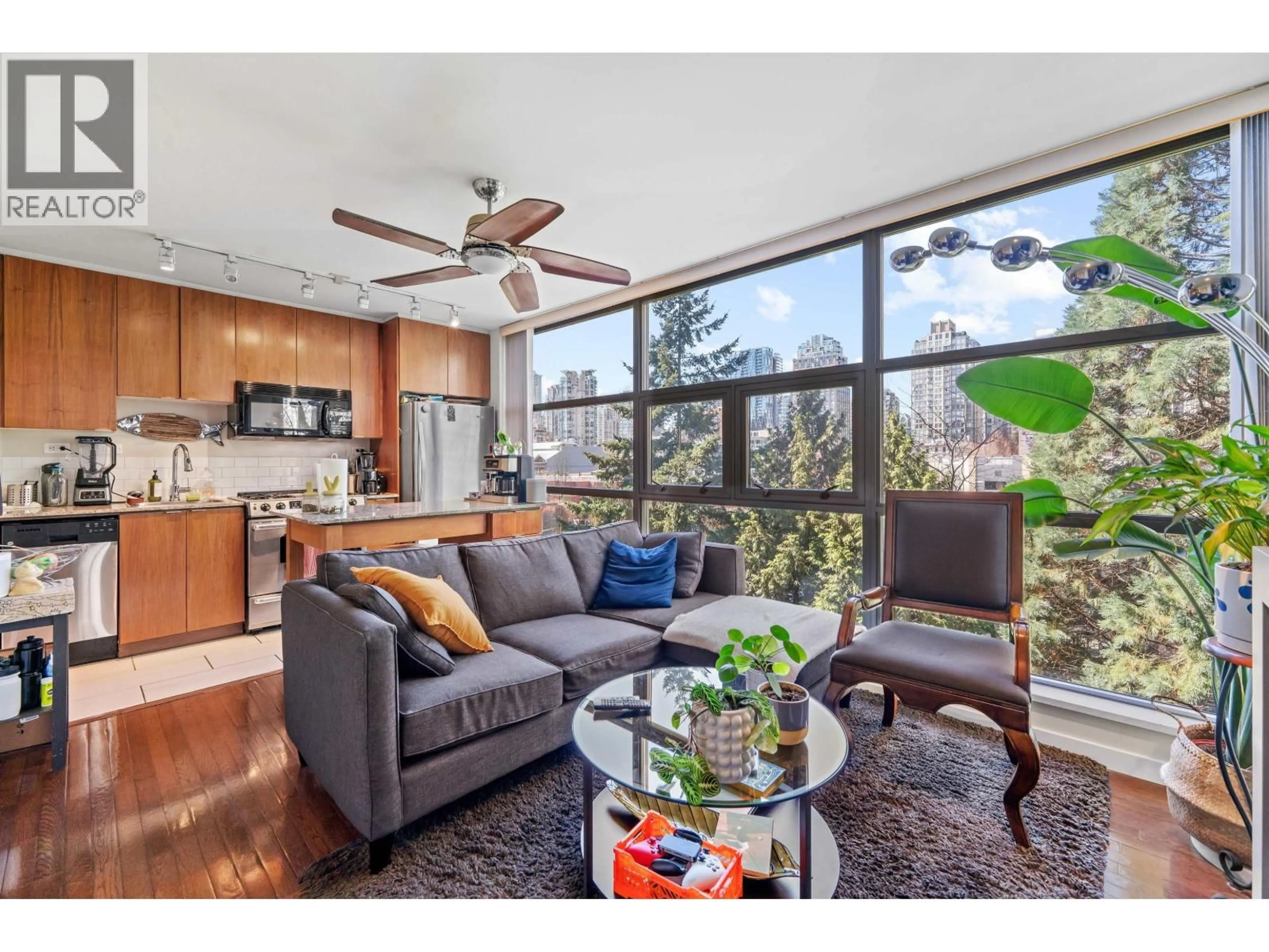 Living room with furniture, wood/laminate floor for 601 - 989 BEATTY STREET, Vancouver British Columbia V6Z3C2