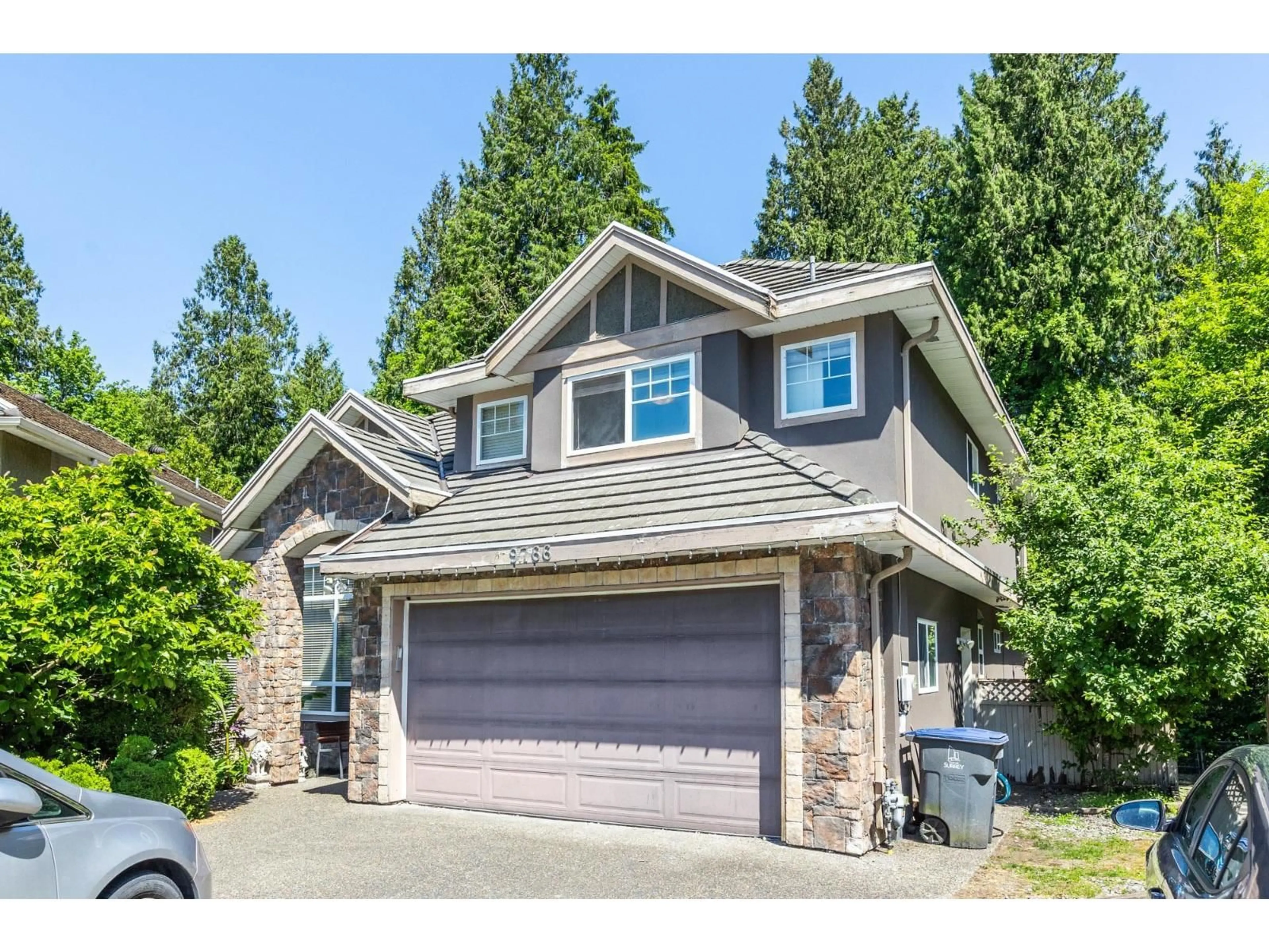 Home with vinyl exterior material, street for 9766 160A STREET, Surrey British Columbia V4N5M1