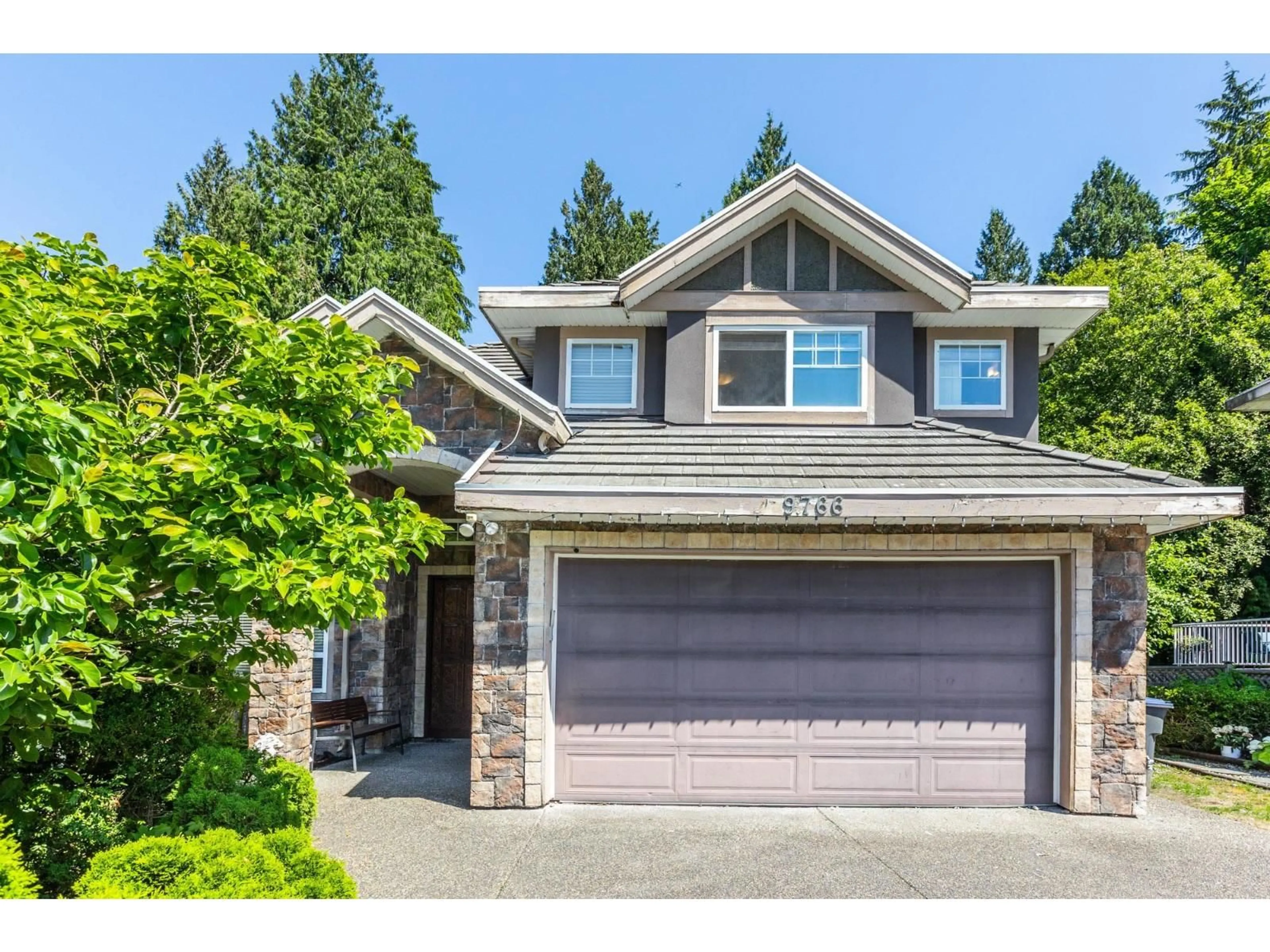 Home with vinyl exterior material, street for 9766 160A STREET, Surrey British Columbia V4N5M1
