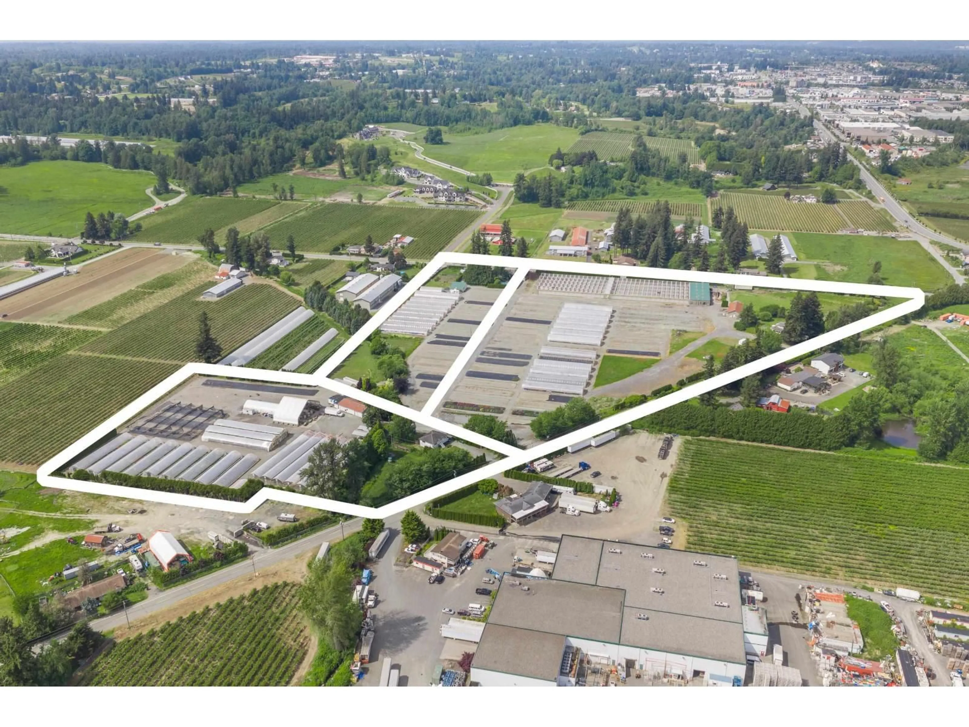 A pic from outside/outdoor area/front of a property/back of a property/a pic from drone, building for 1899 PEARDONVILLE ROAD, Abbotsford British Columbia V4X2M3