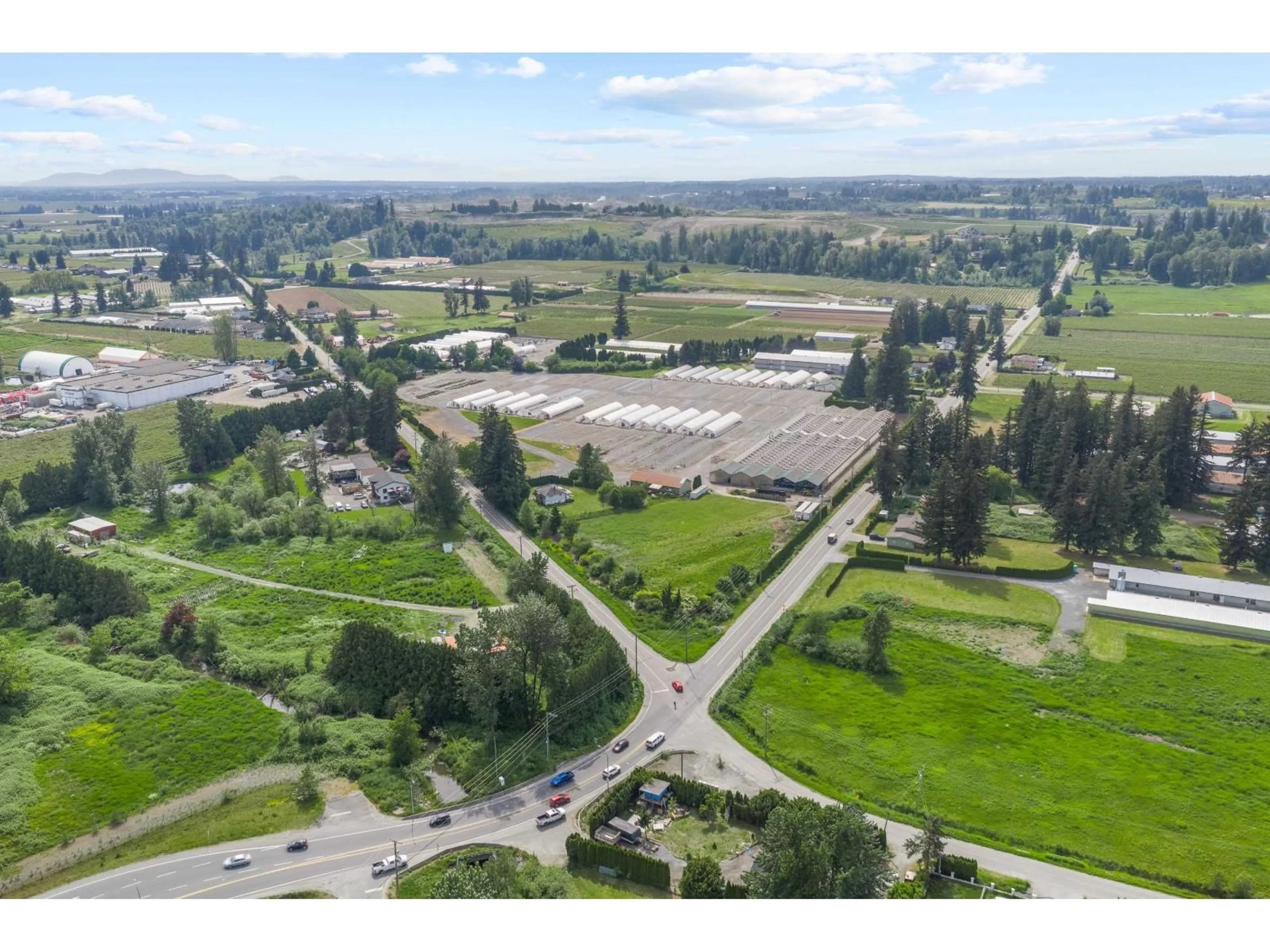 A pic from outside/outdoor area/front of a property/back of a property/a pic from drone, mountain view for 1899 PEARDONVILLE ROAD, Abbotsford British Columbia V4X2M3
