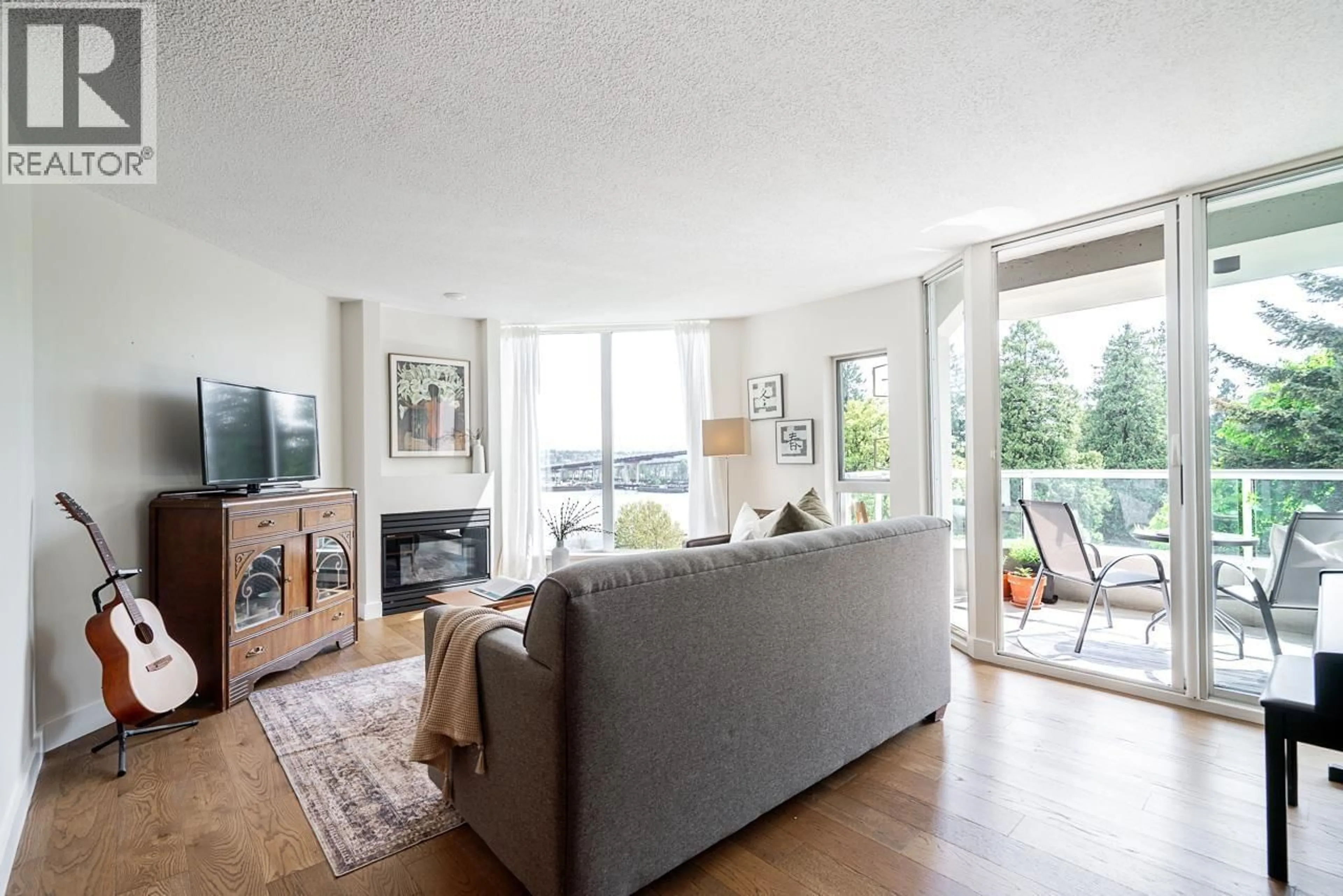 Living room with furniture, unknown for 706 - 69 JAMIESON COURT, New Westminster British Columbia V3L5R3