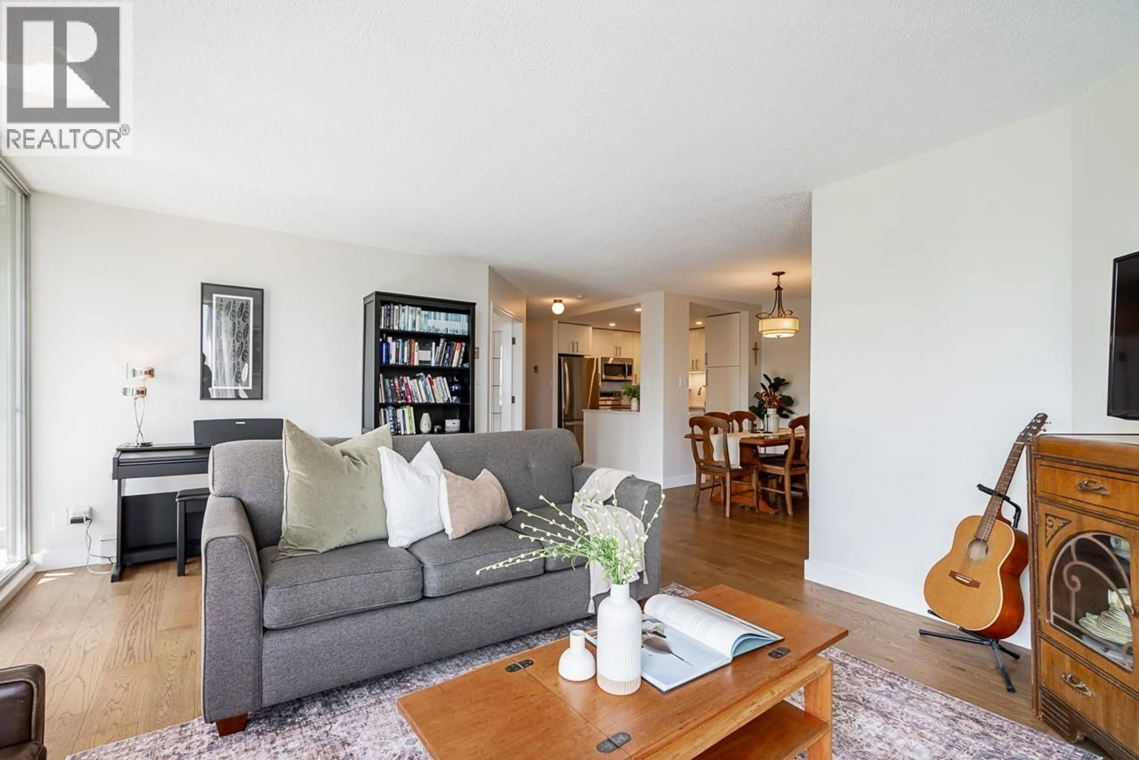 Living room with furniture, wood/laminate floor for 706 - 69 JAMIESON COURT, New Westminster British Columbia V3L5R3