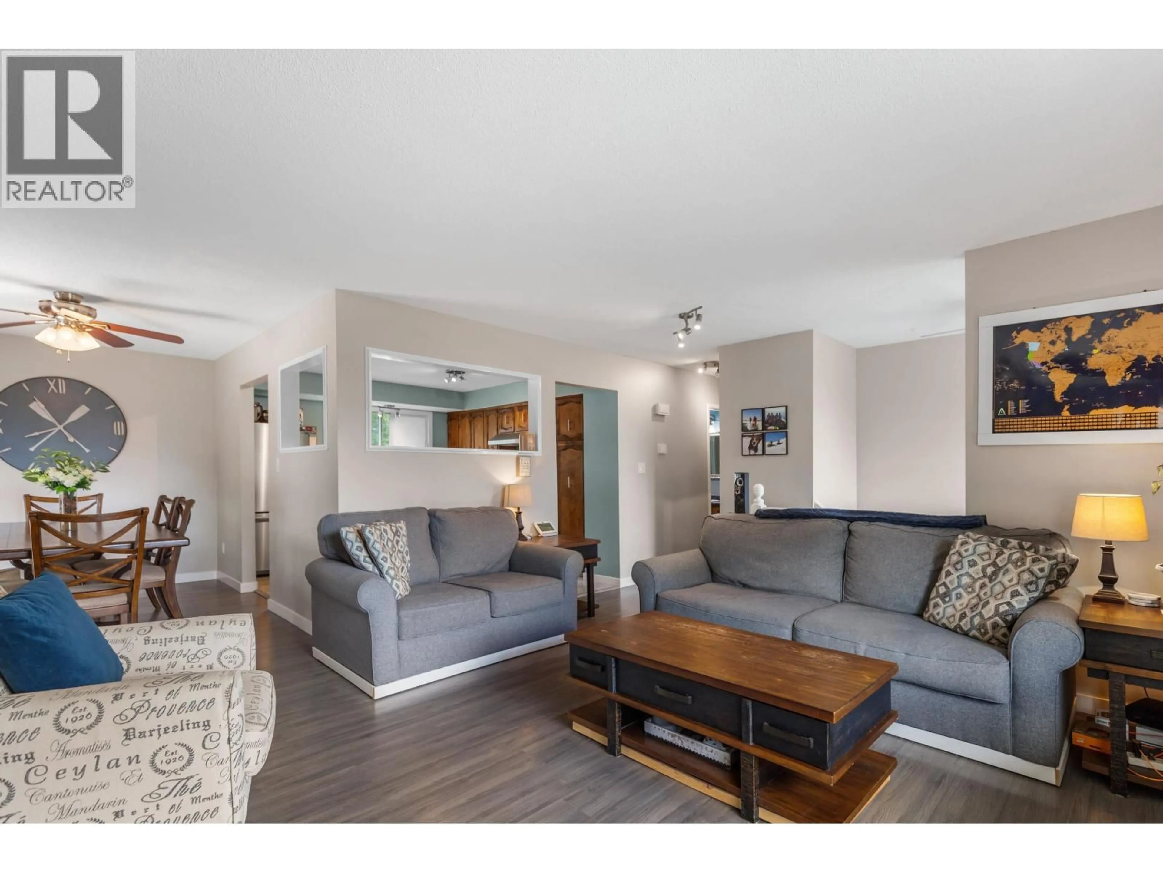 Living room with furniture, wood/laminate floor for 3127 WALLACE CRESCENT, Prince George British Columbia V2K3V4
