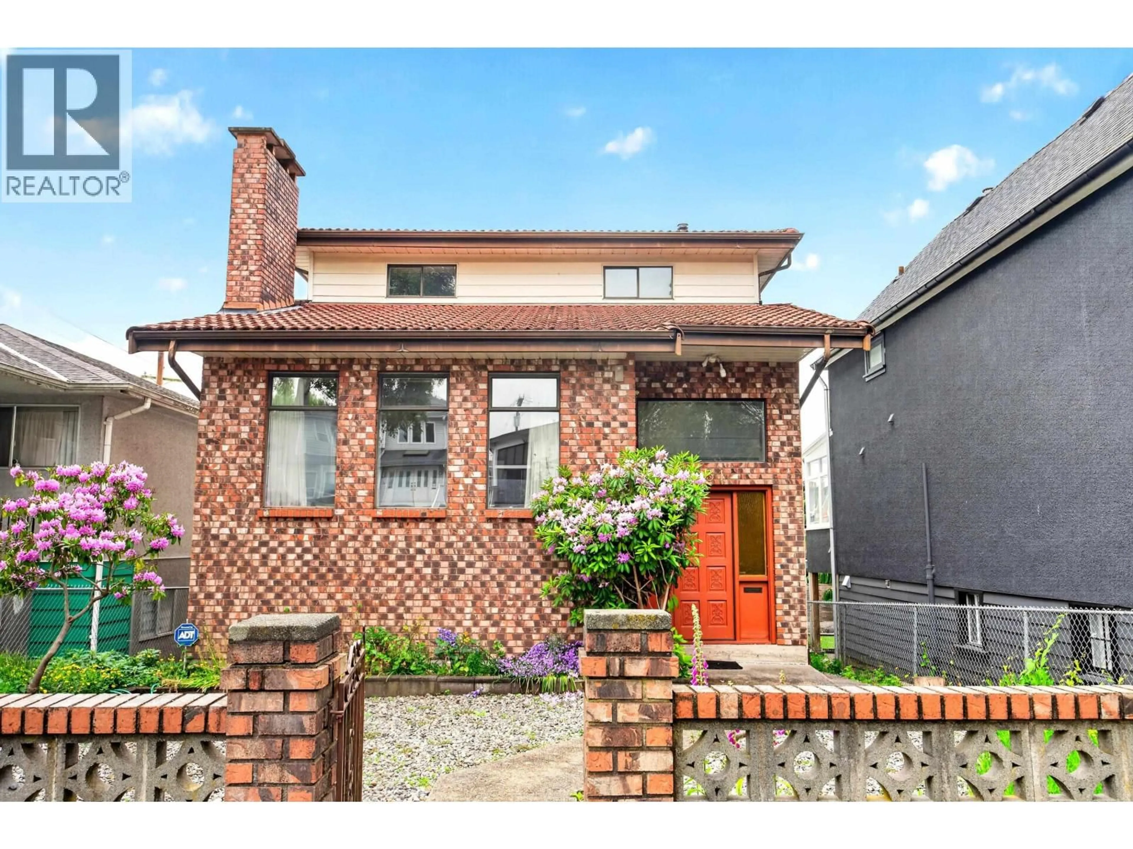 Home with brick exterior material, street for 2031 23RD AVENUE, Vancouver British Columbia V5N2T9