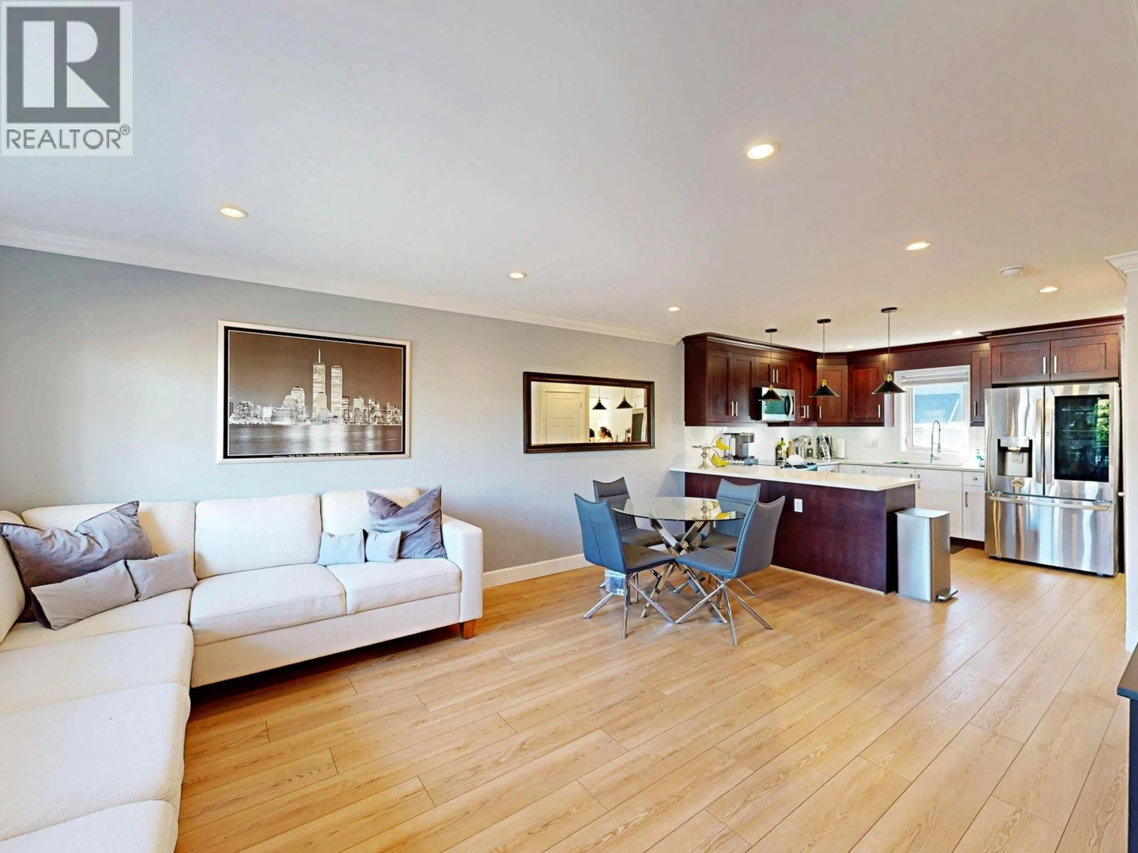 Open concept kitchen, wood/laminate floor for 7377 STRIDE AVENUE, Burnaby British Columbia V3N1V3