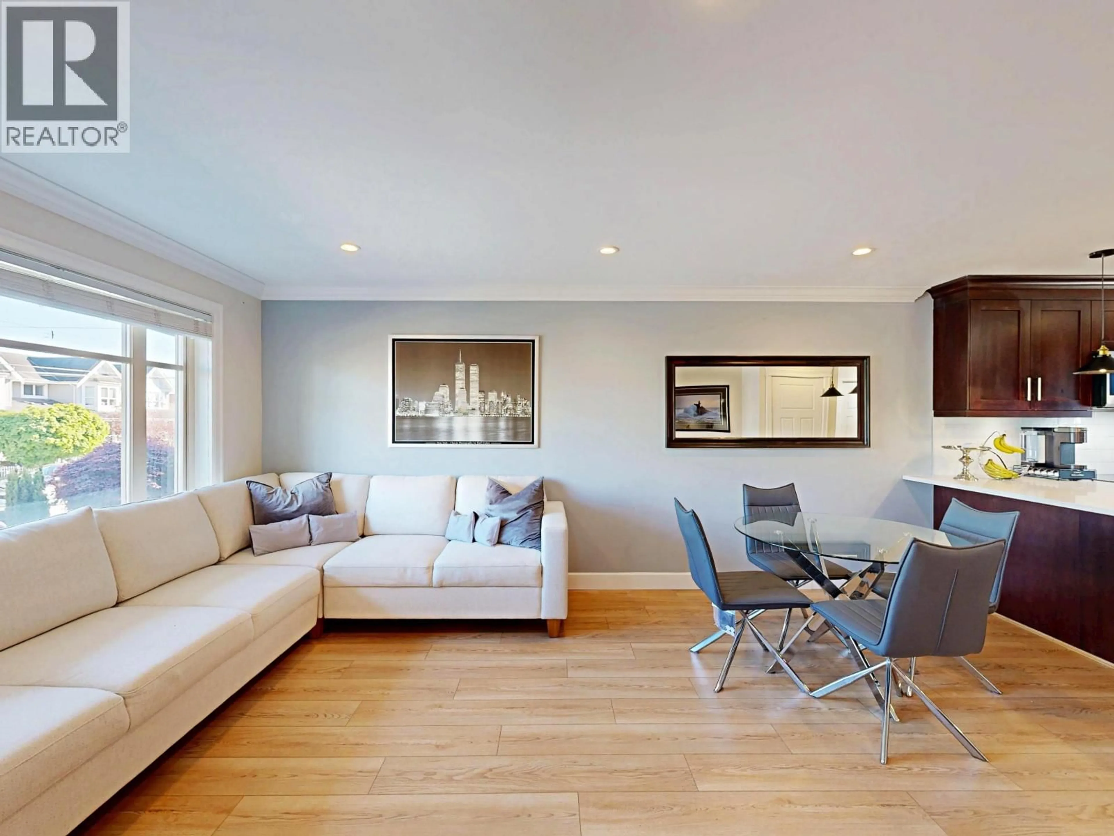 Living room with furniture, wood/laminate floor for 7377 STRIDE AVENUE, Burnaby British Columbia V3N1V3