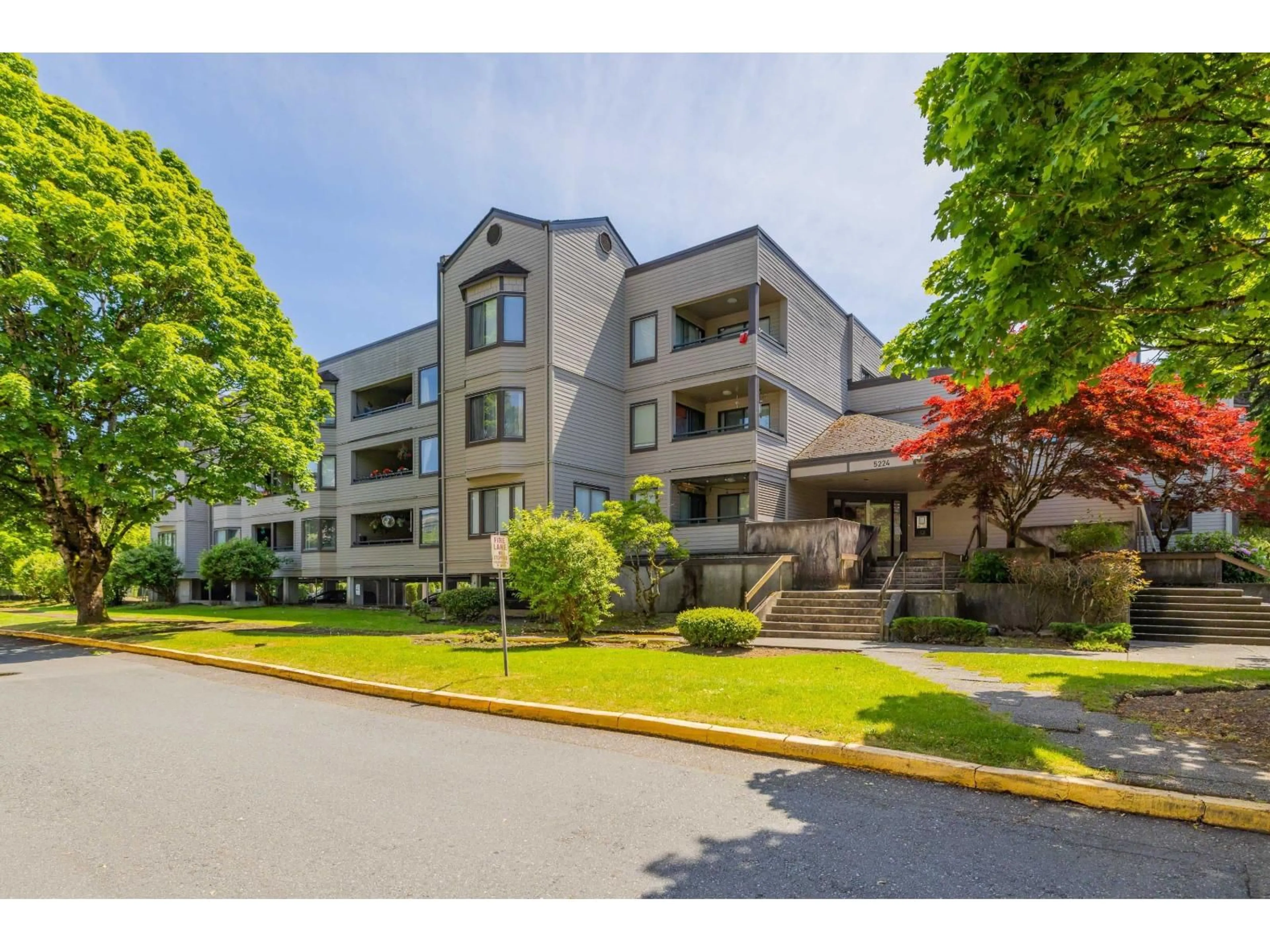 A pic from outside/outdoor area/front of a property/back of a property/a pic from drone, unknown for 214 - 5224 204 STREET, Langley British Columbia V3A3N1