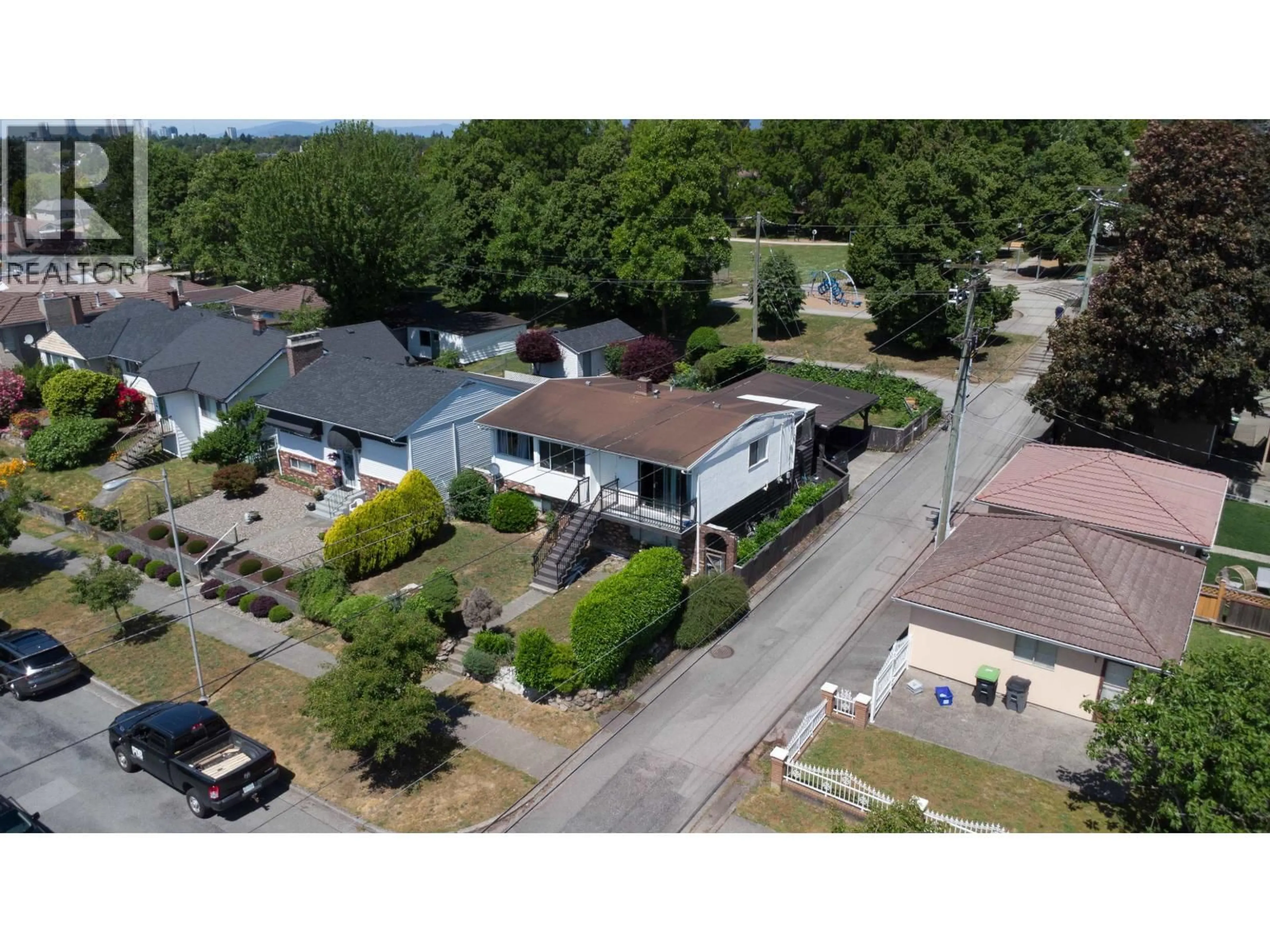 A pic from outside/outdoor area/front of a property/back of a property/a pic from drone, street for 1987 61ST AVENUE, Vancouver British Columbia V5P2K2