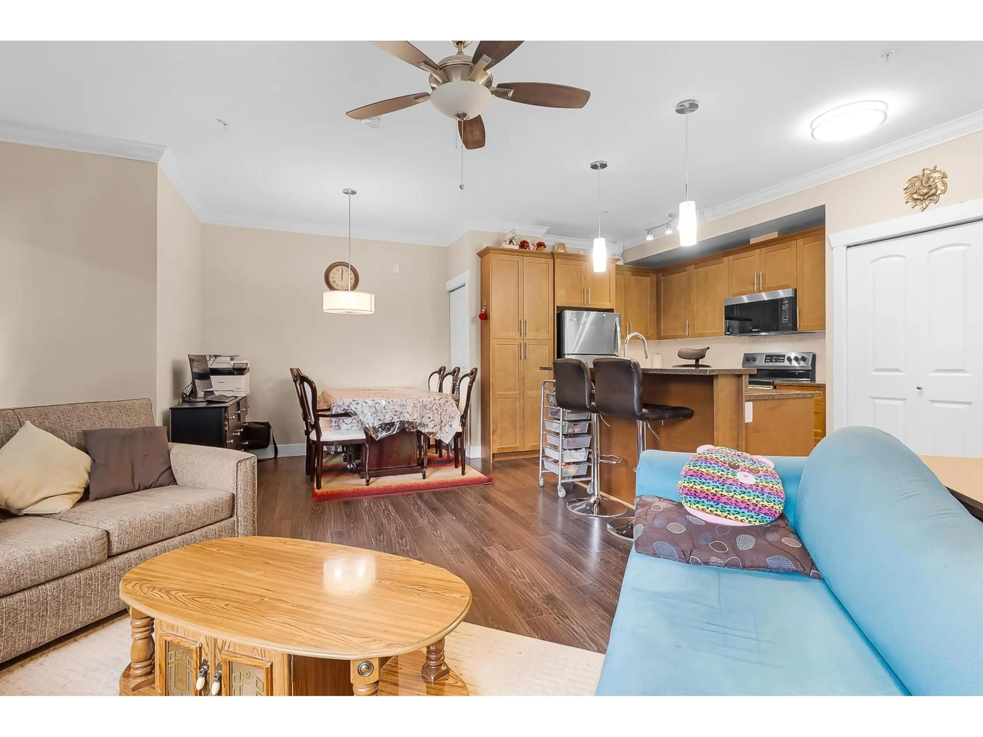 Open concept kitchen, wood/laminate floor for 211 - 8183 121A STREET STREET, Surrey British Columbia V3W1S7