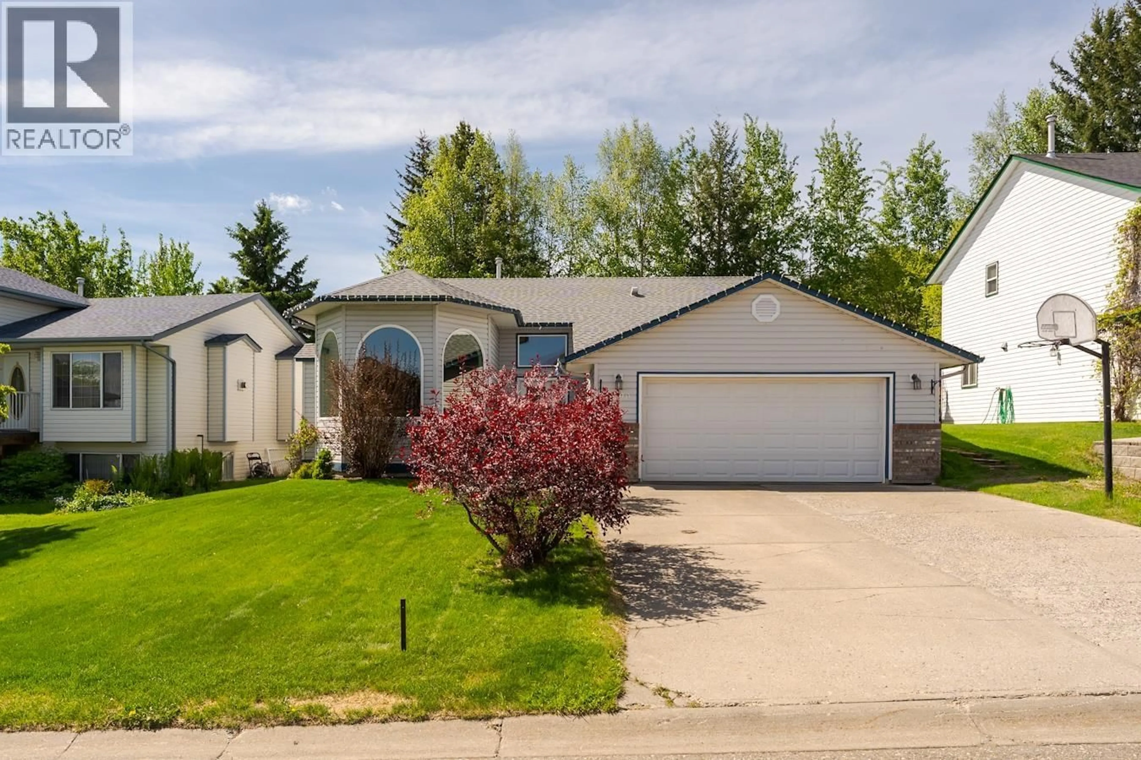 Home with vinyl exterior material, street for 3190 VISTA RISE ROAD, Prince George British Columbia V2N6R8