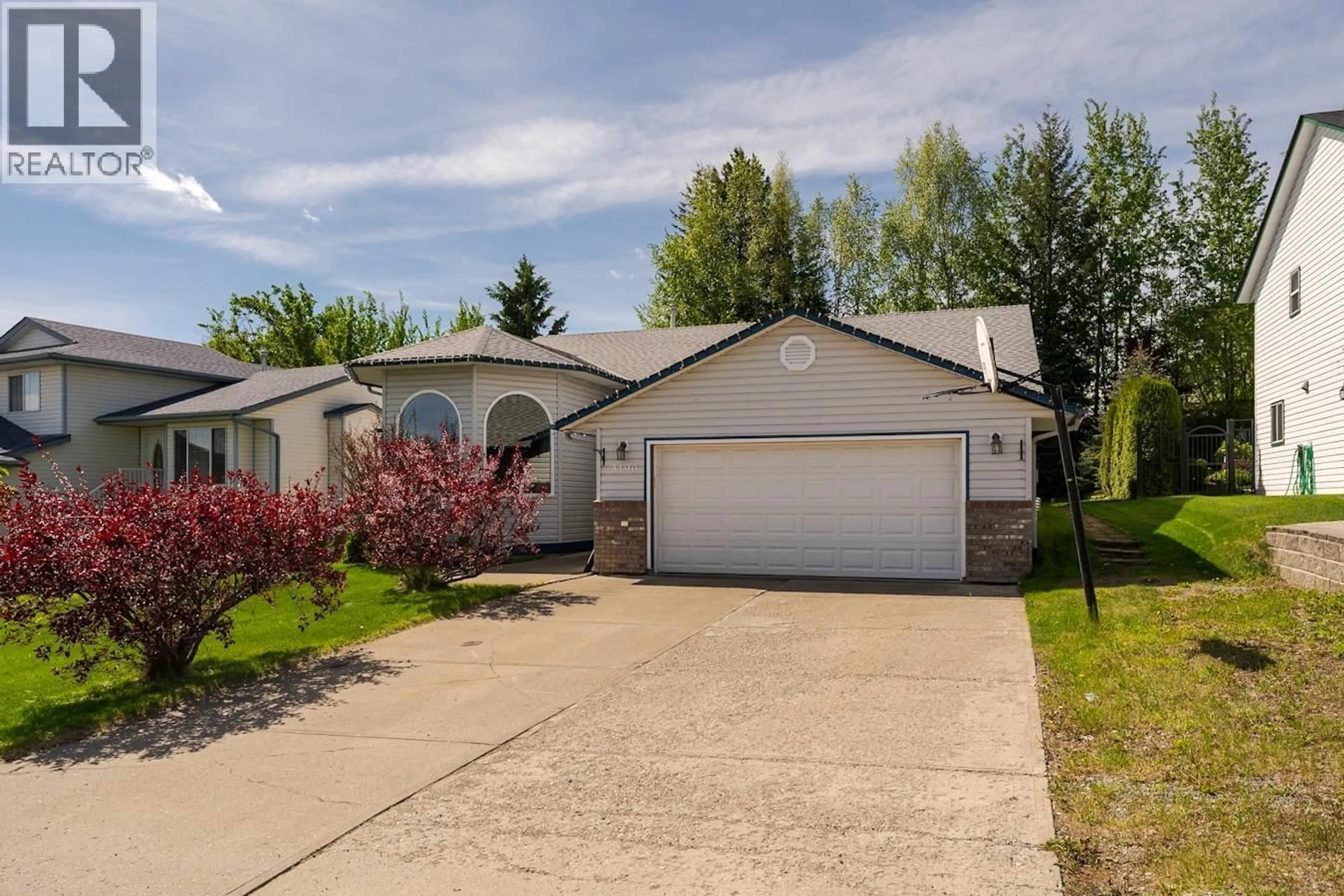 Home with vinyl exterior material, street for 3190 VISTA RISE ROAD, Prince George British Columbia V2N6R8