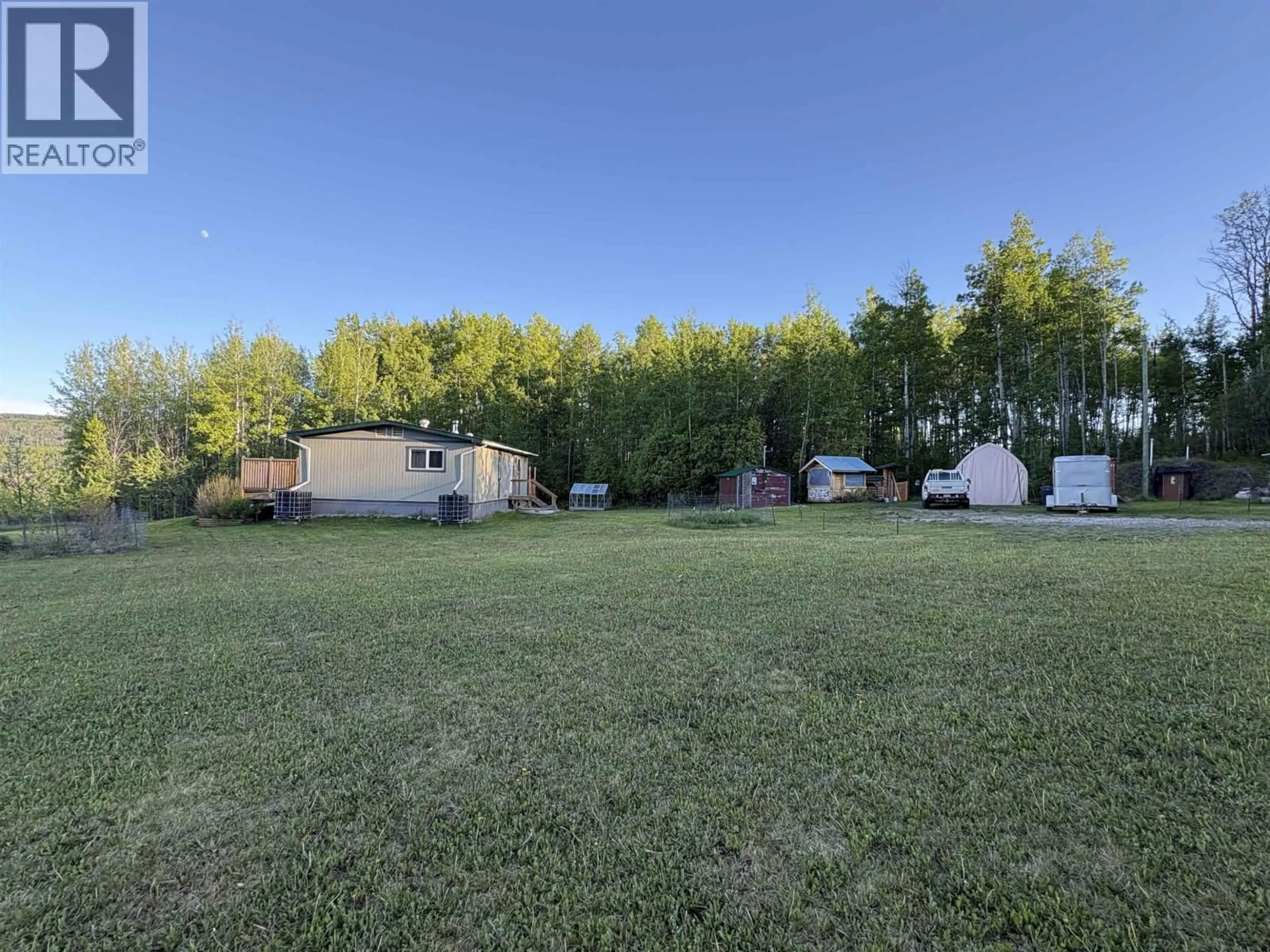 A pic from outside/outdoor area/front of a property/back of a property/a pic from drone, unknown for 20154 BEATTIE DRIVE, Hudsons Hope British Columbia V0C1V0