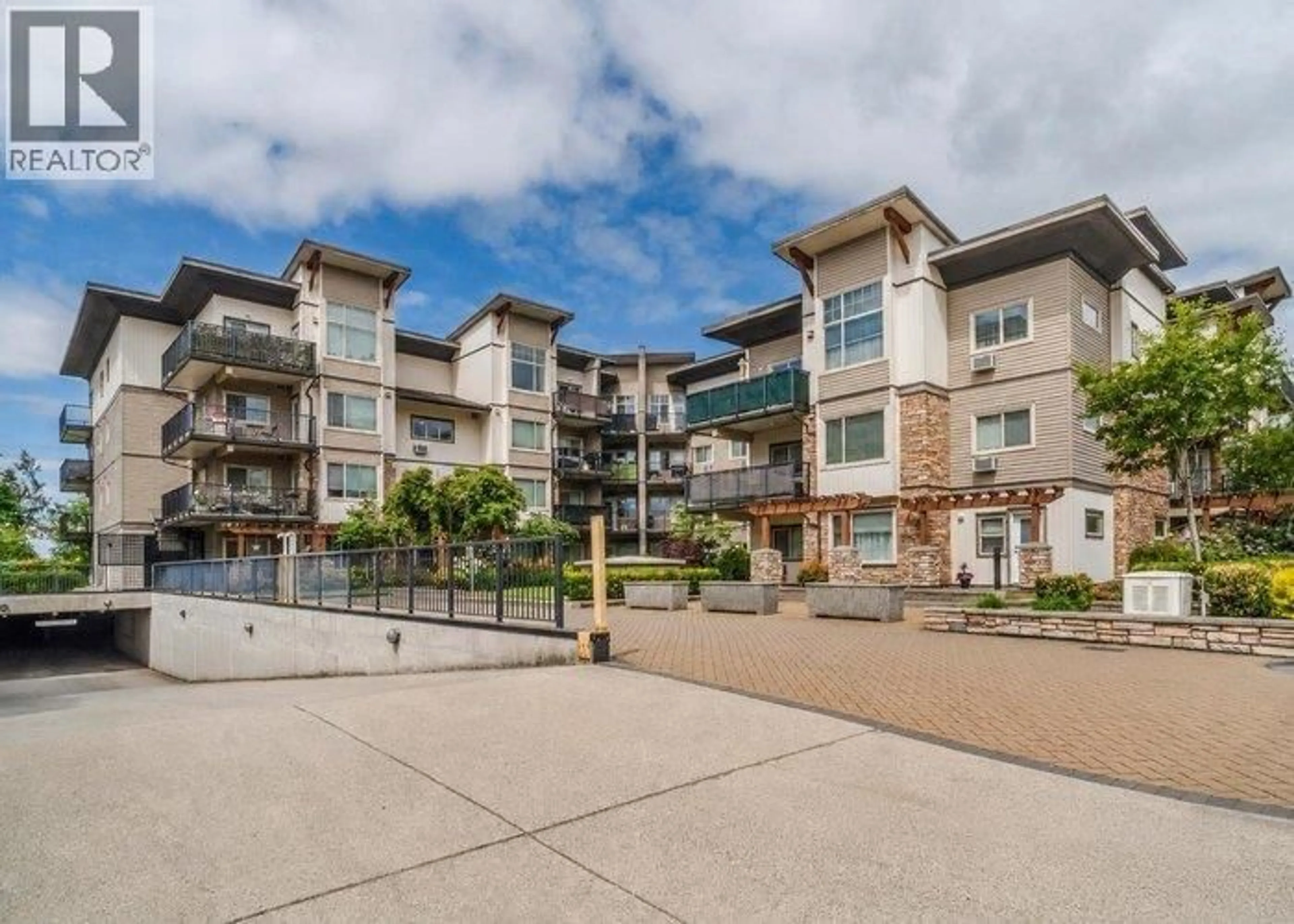 A pic from outside/outdoor area/front of a property/back of a property/a pic from drone, water/lake/river/ocean view for 317 - 11935 BURNETT STREET, Maple Ridge British Columbia V2X9A9