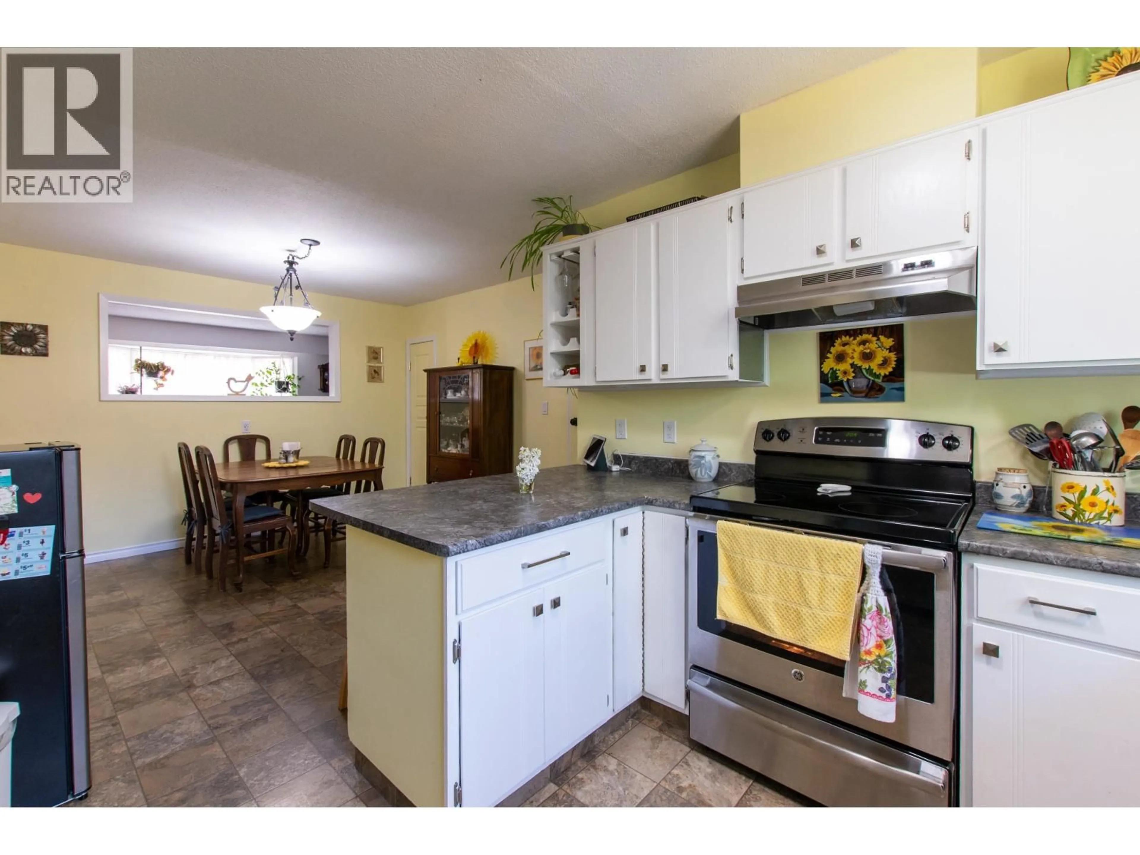 Open concept kitchen, ceramic/tile floor for 3091 SPRUCE STREET, Prince George British Columbia V2L2S6