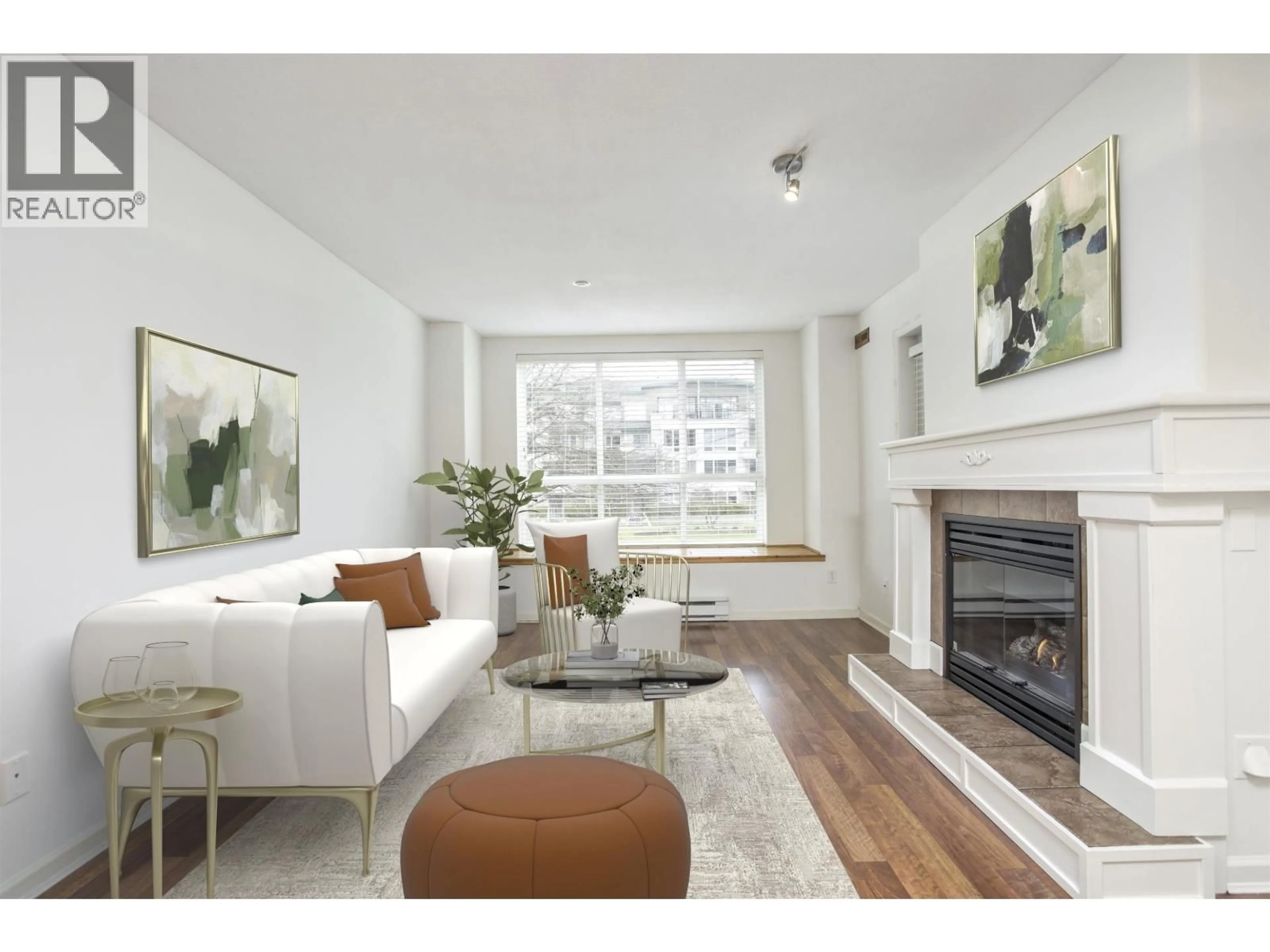Living room with furniture, wood/laminate floor for 212 - 12633 NO. 2 ROAD, Richmond British Columbia V7E6N5