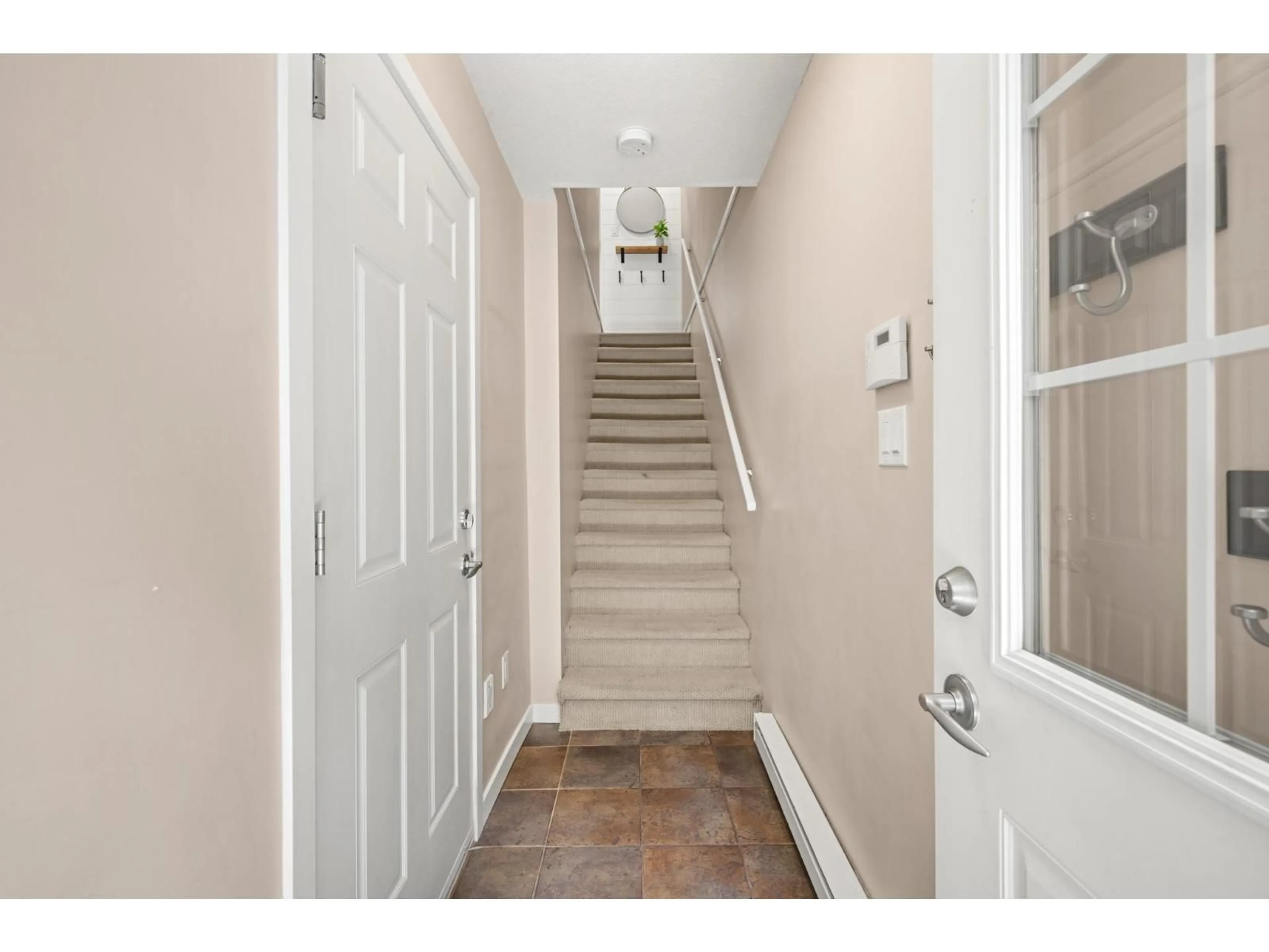 Indoor entryway for 75 - 18701 66 AVENUE, Surrey British Columbia V3S4P3
