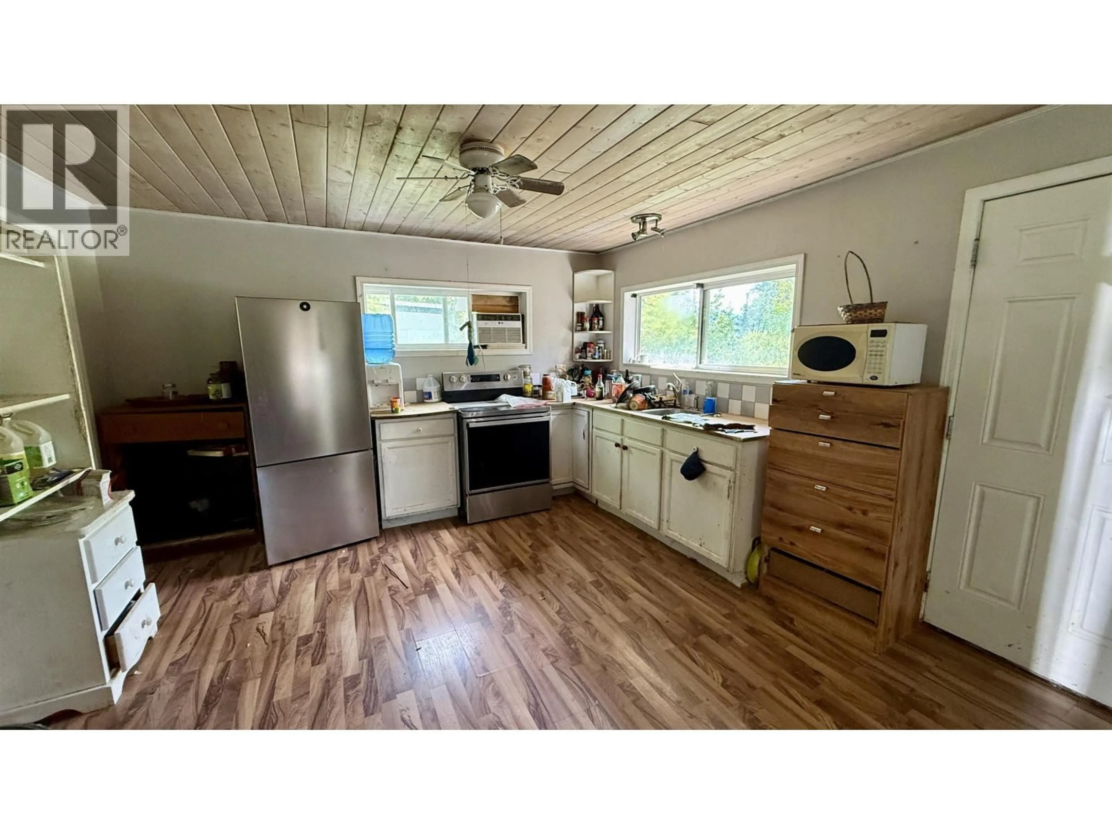 Standard kitchen, wood/laminate floor for 7573 RESORT ROAD, Canim Lake British Columbia V0K1J0